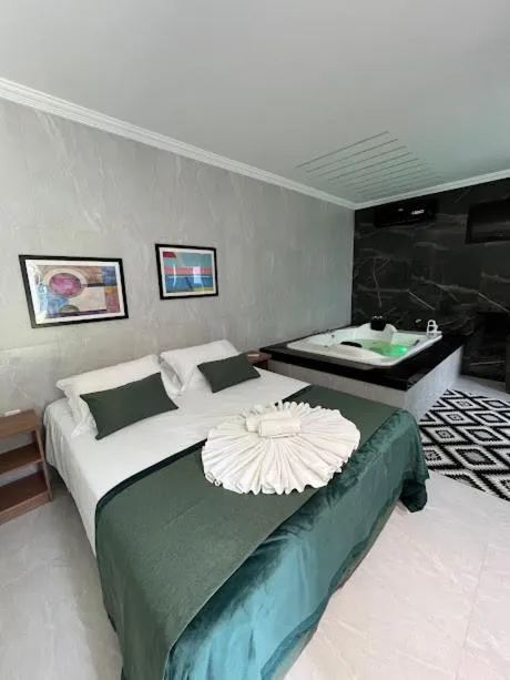 Bed in Pousada Recanto Jota Ge