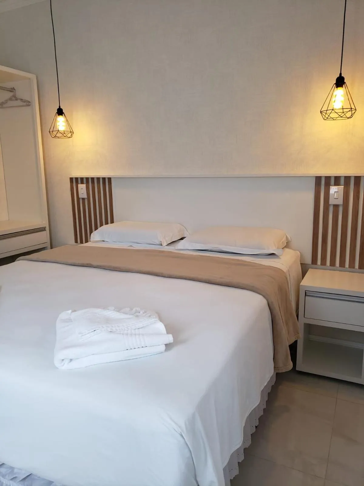 Bed in Pousada Recanto Jota Ge