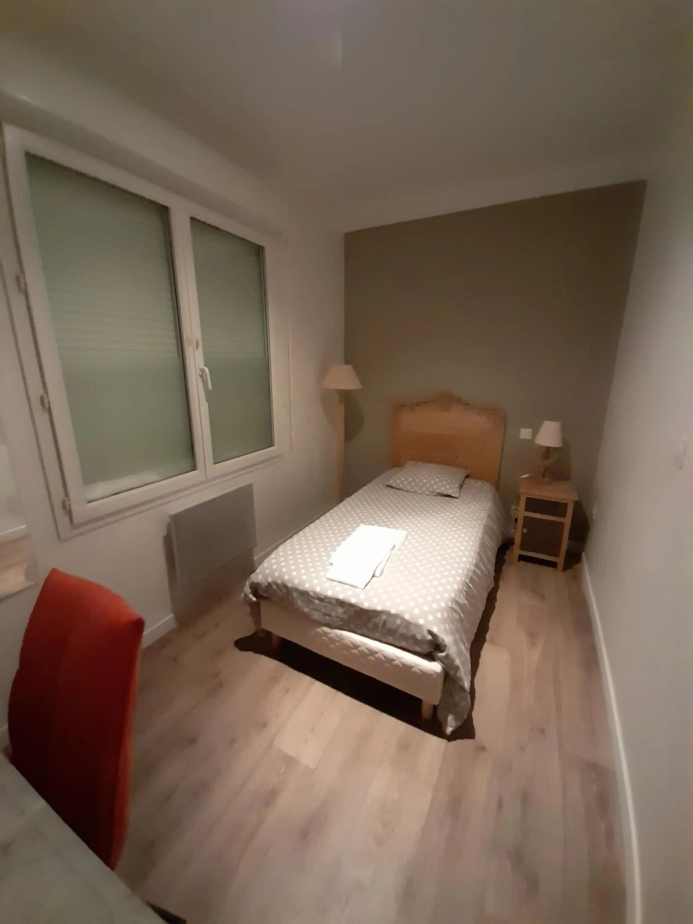 Bed in Hotel Les Voyageurs