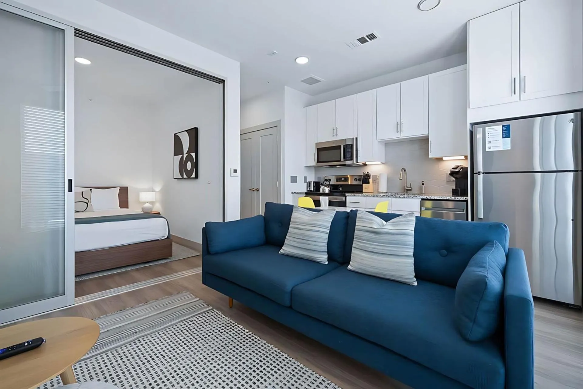 Living room, Bed in Placemakr Downtown Austin