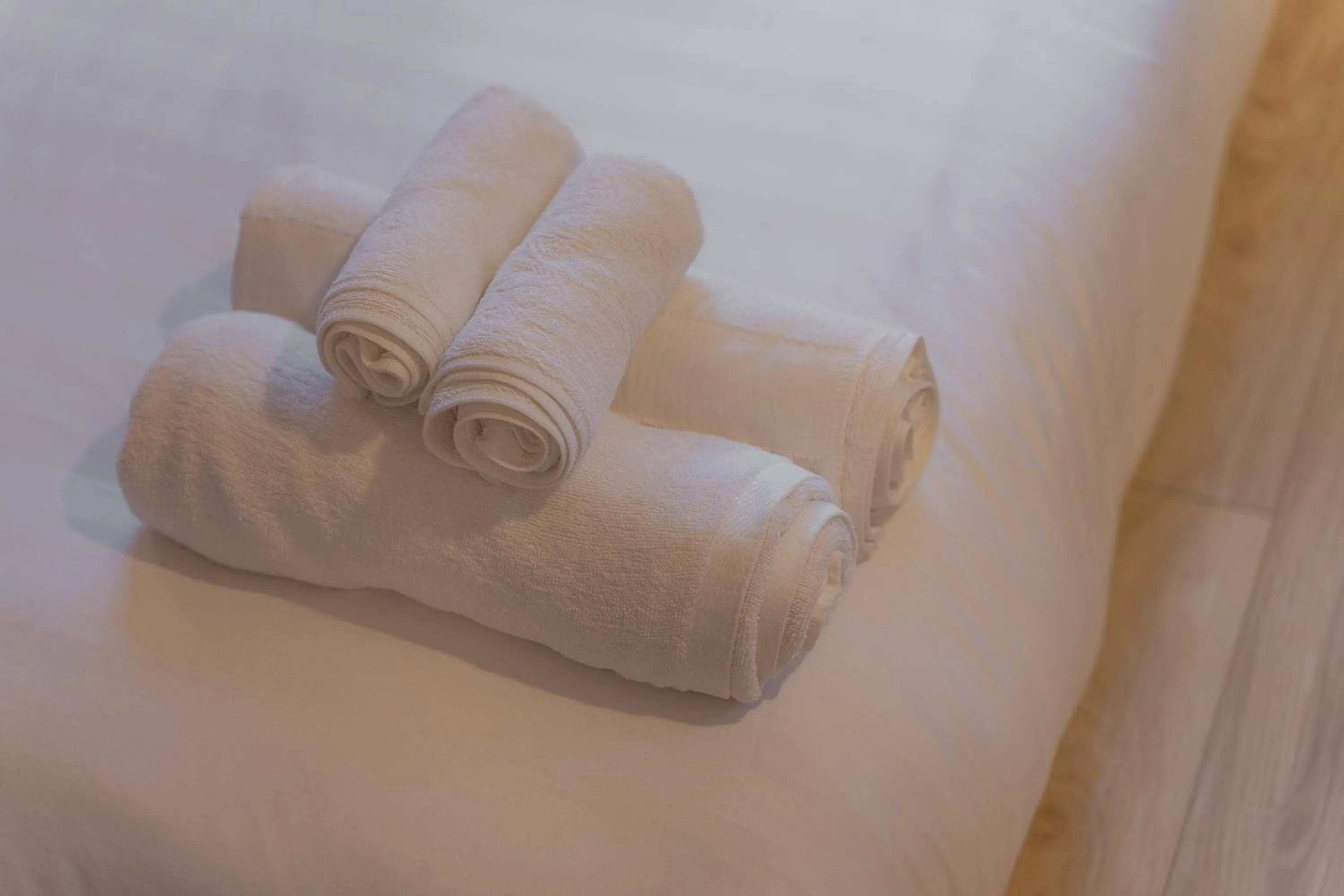 towels, Bed in Monruamsuk Homestay Cafe and Bistro