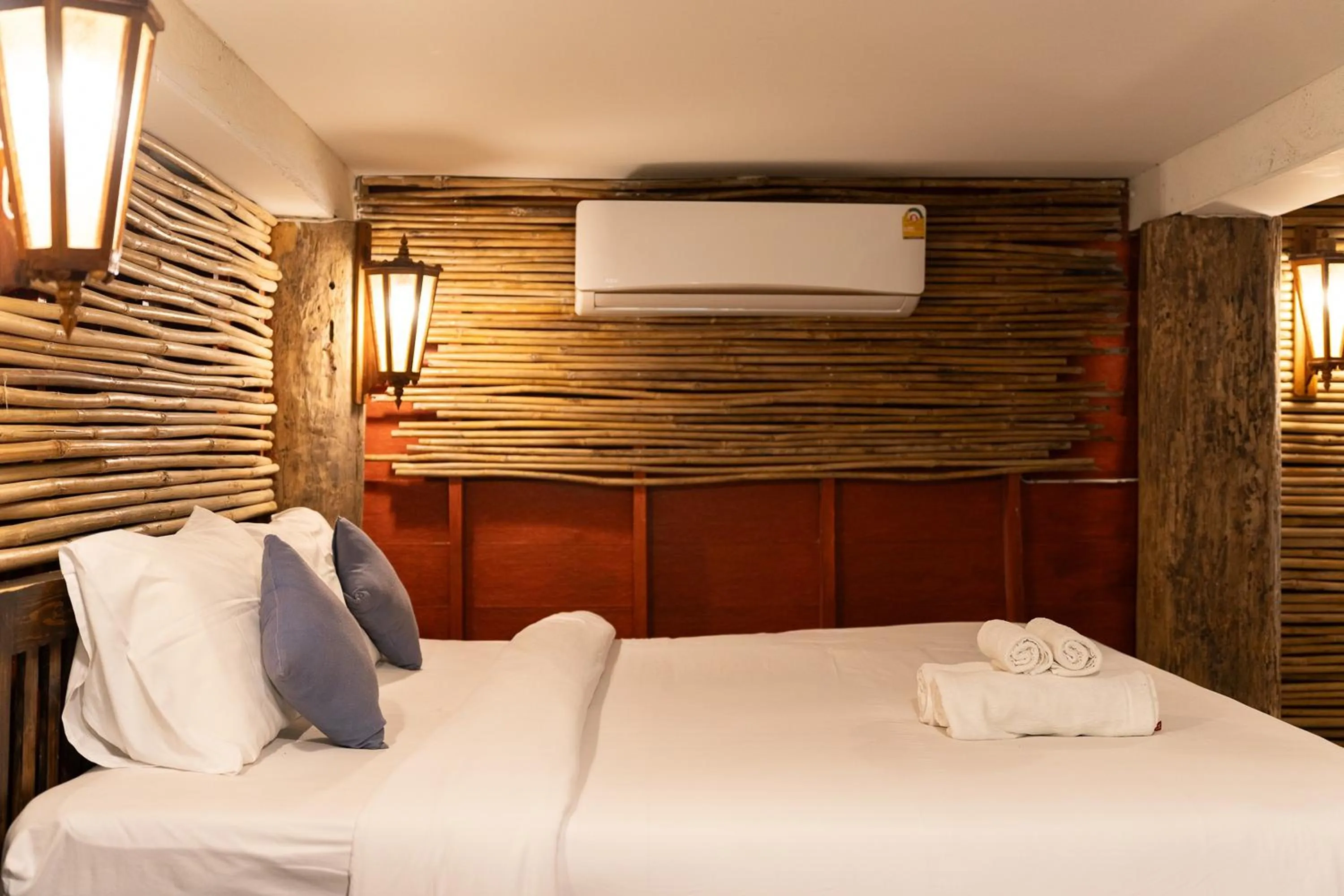 Bed in Monruamsuk Homestay Cafe and Bistro