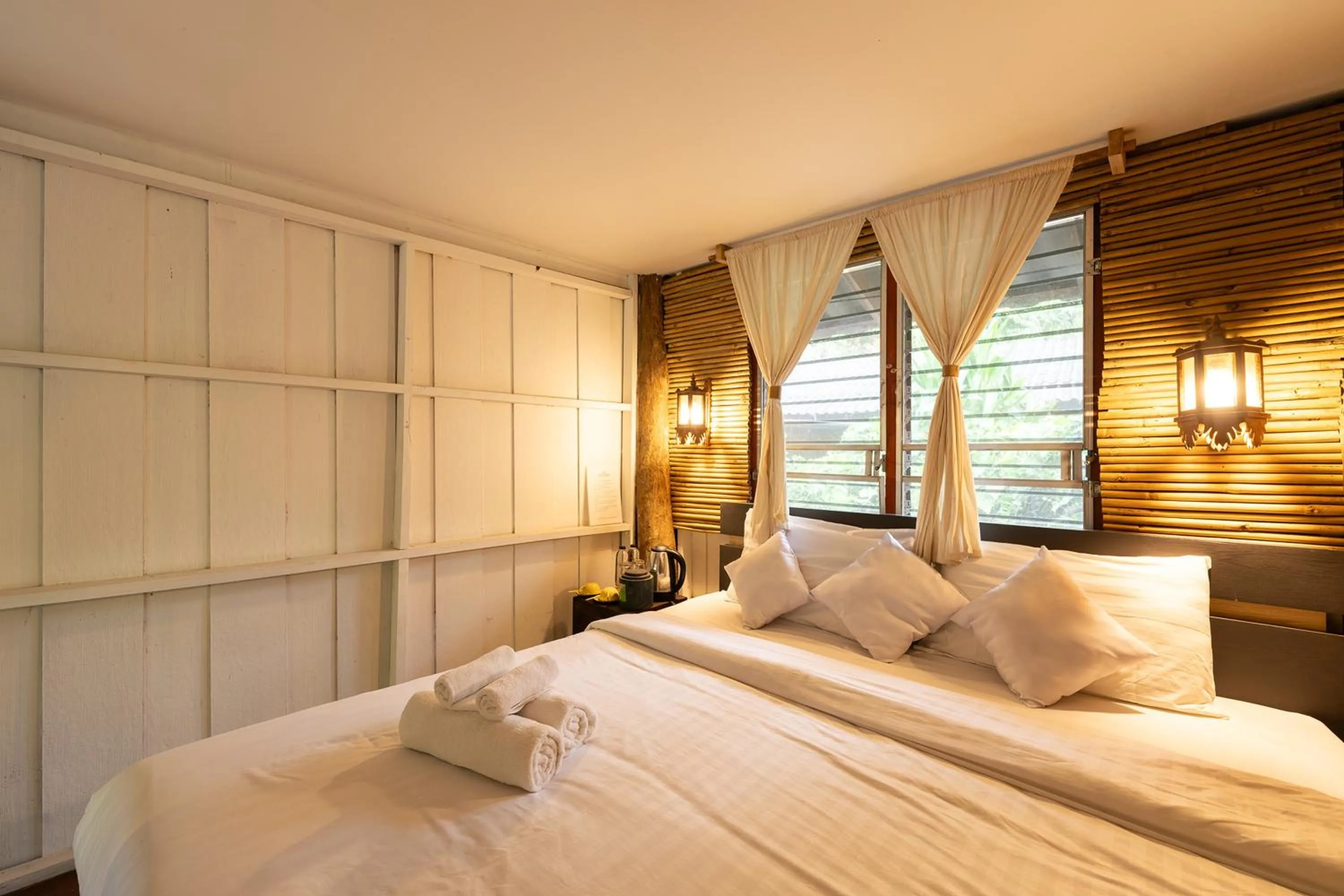 Bed in Monruamsuk Homestay Cafe and Bistro