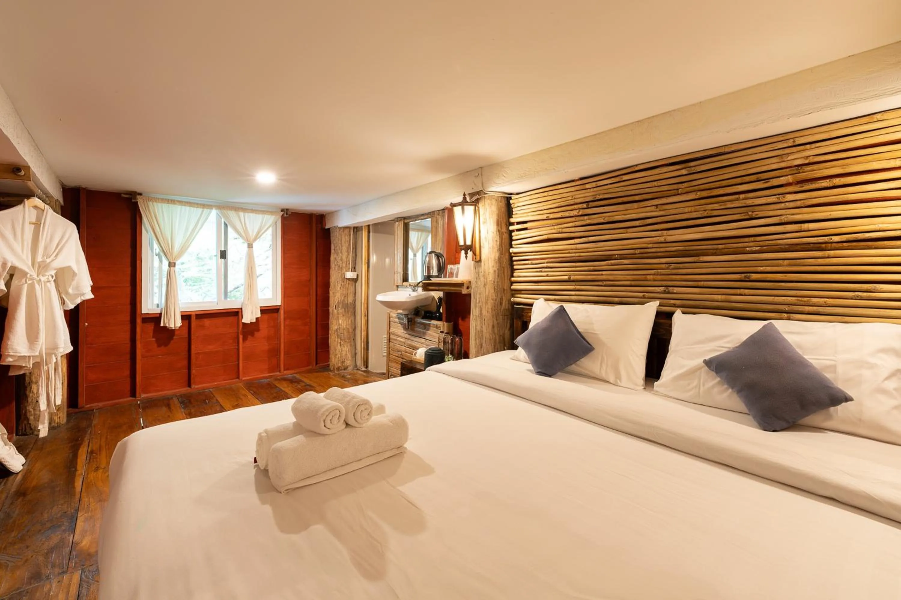 Bed in Monruamsuk Homestay Cafe and Bistro