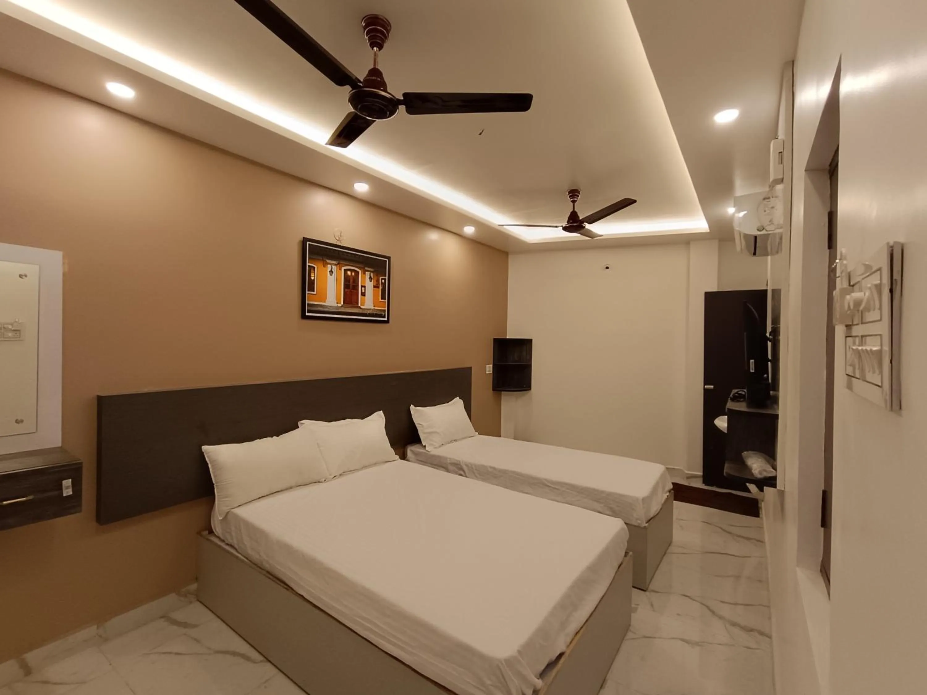 Bed in Arul Residency