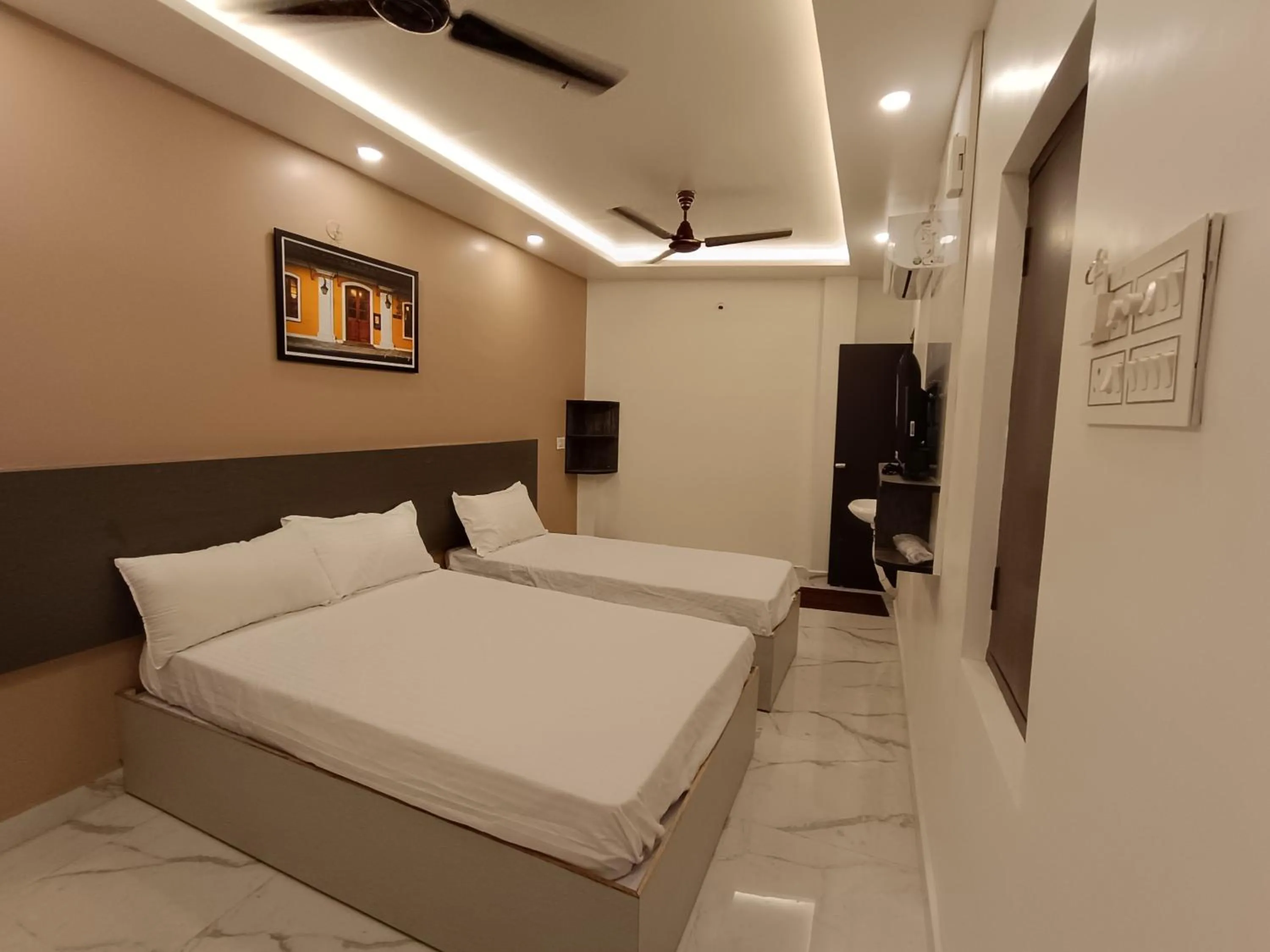 Bed in Arul Residency