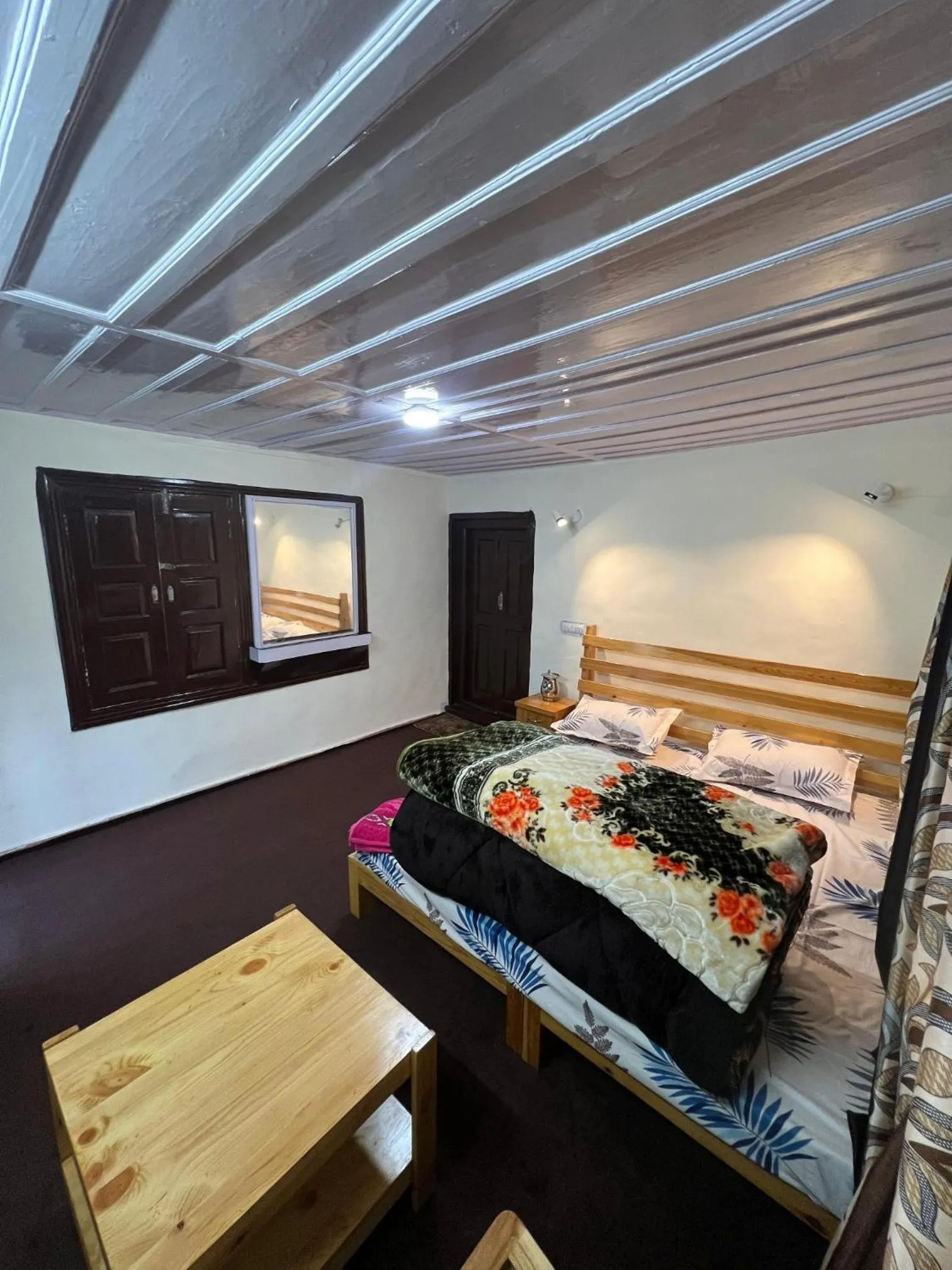 Bed in HOTEL NIRVANA