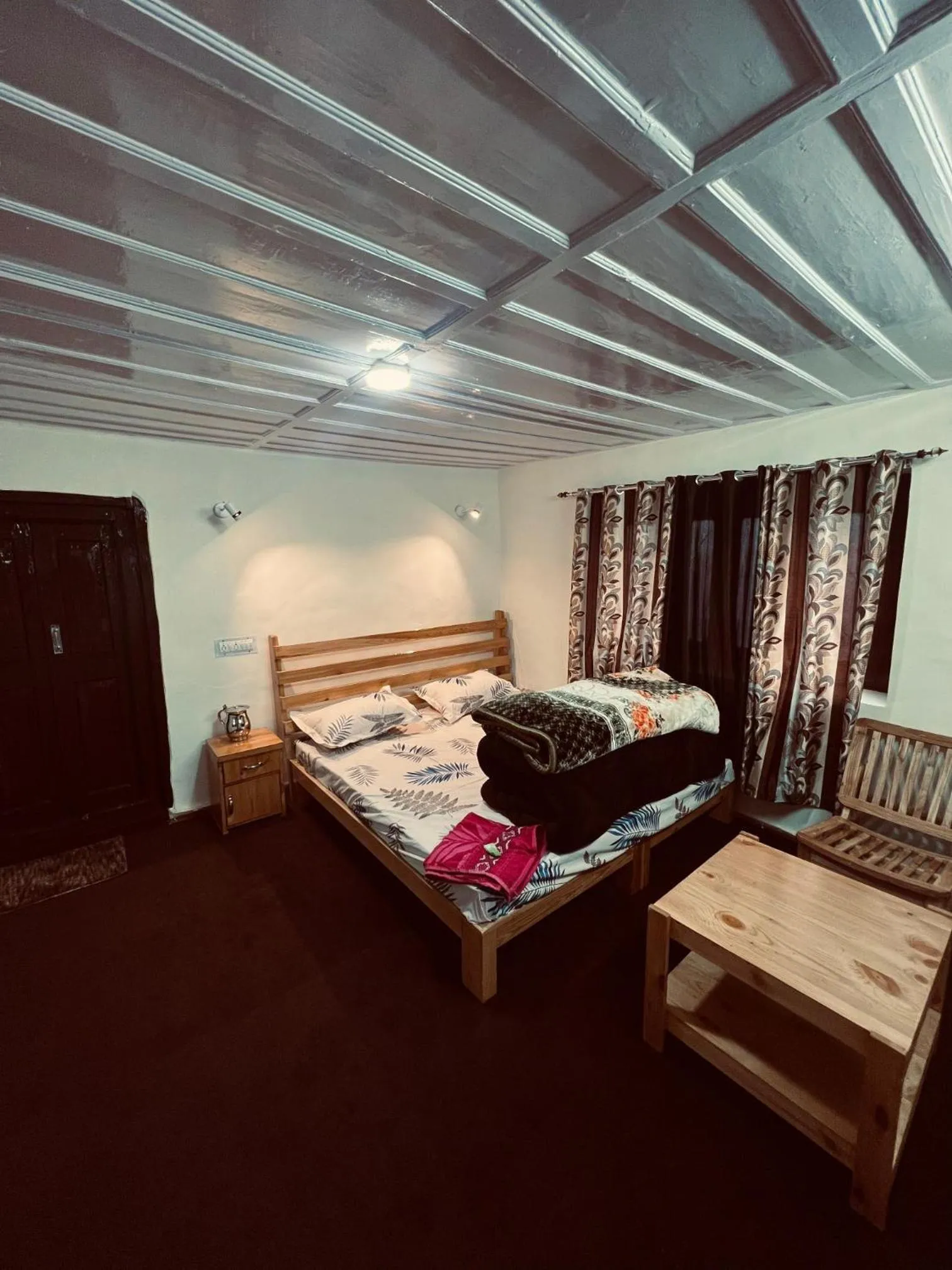 Bed in HOTEL NIRVANA