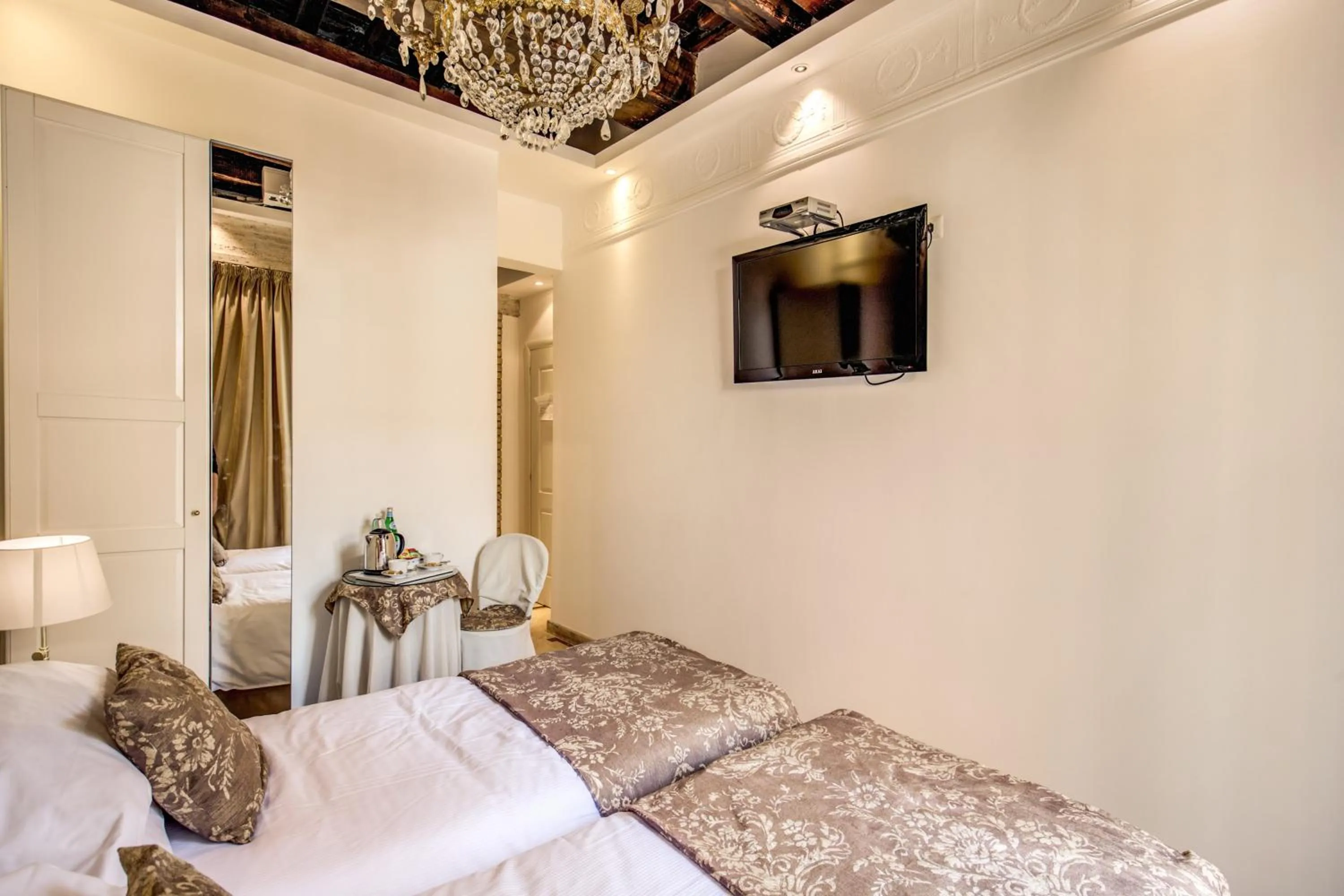 Bed in Pantheonview - Luxury Suites