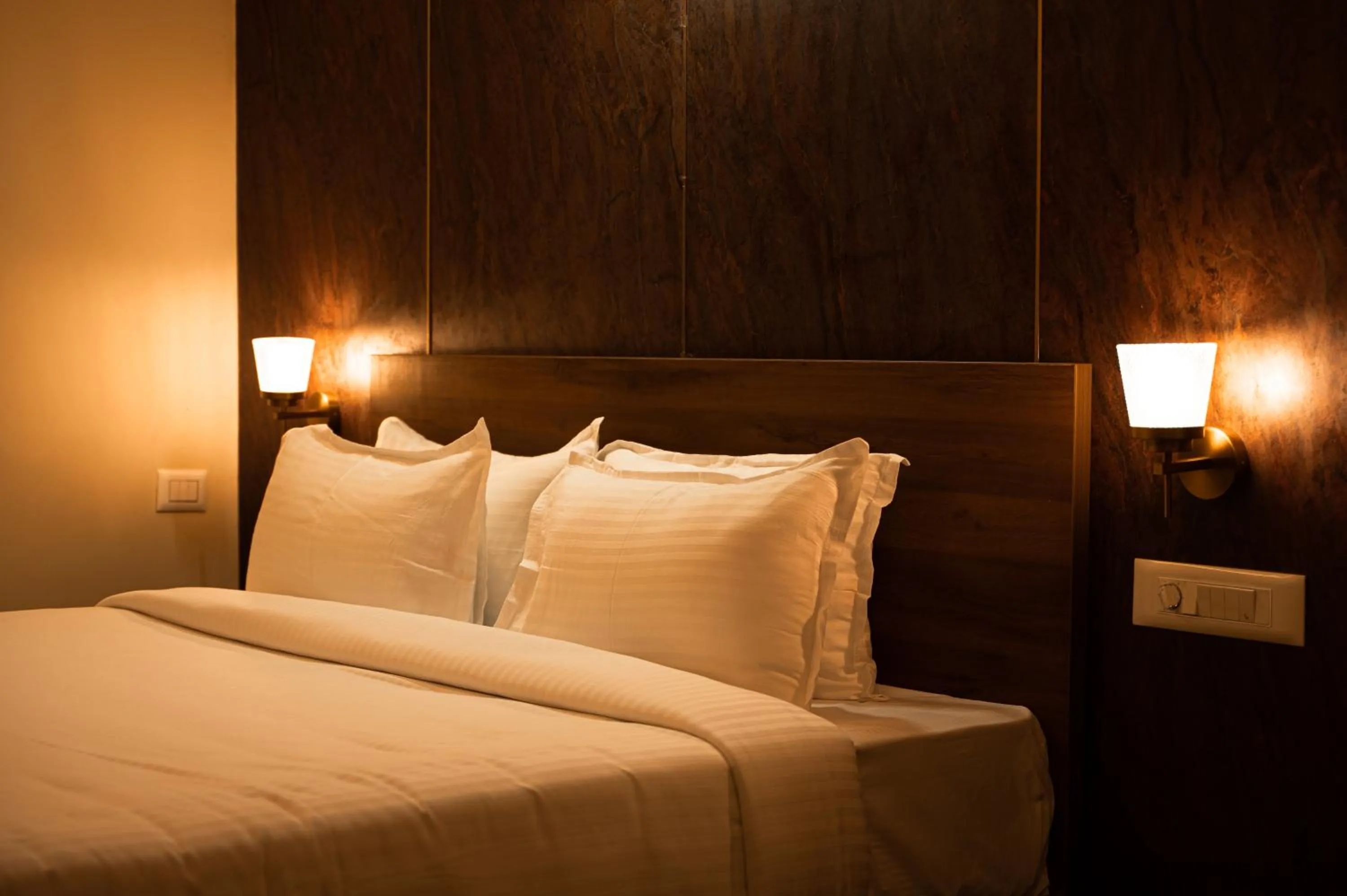 Bed in Poojaris Nirantara - Mysuru