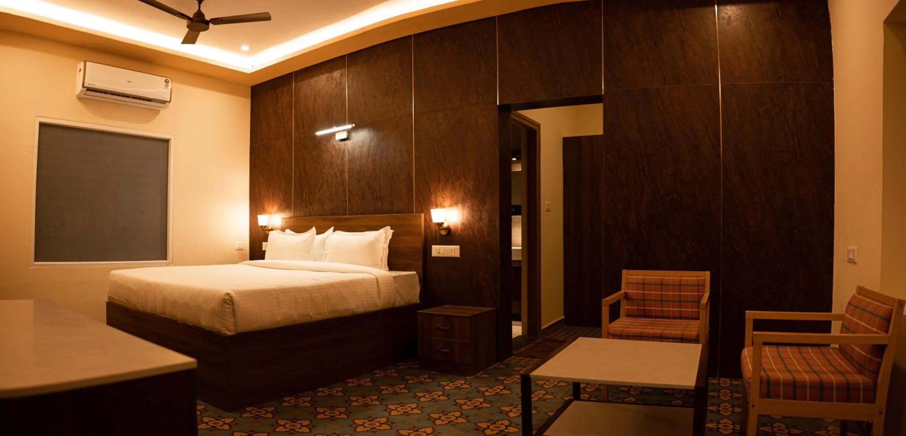 Bed in Poojaris Nirantara - Mysuru