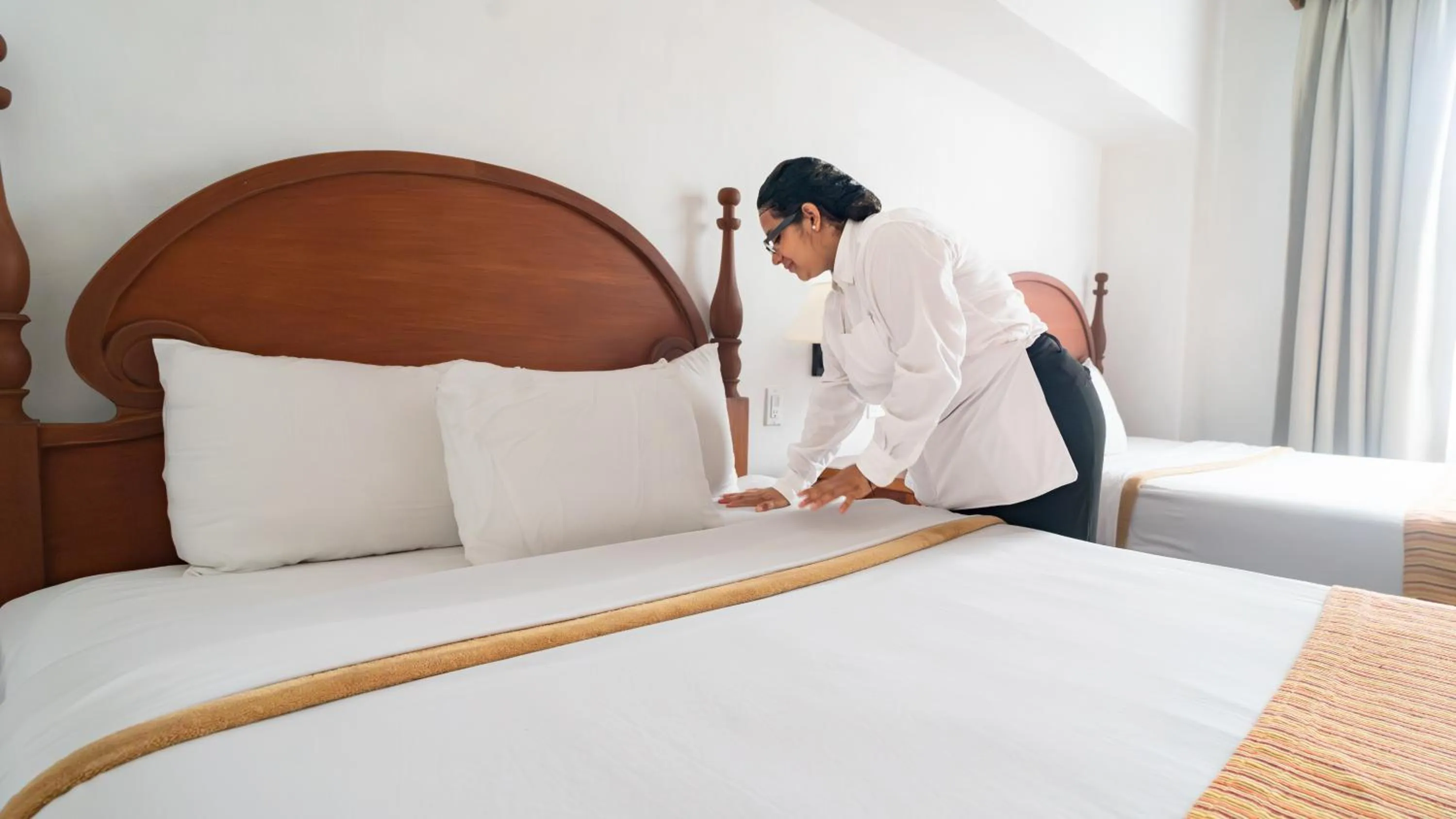 Bed in Amatique Bay Hotel