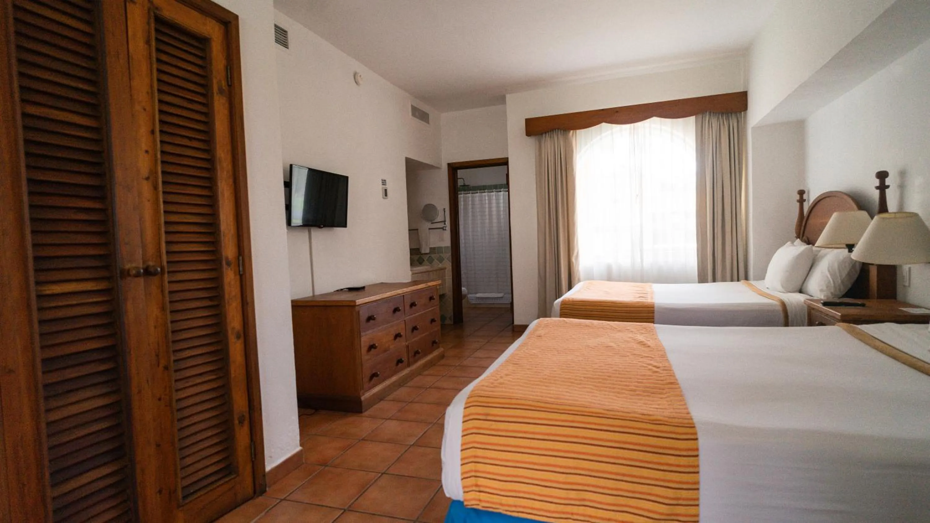 Bed in Amatique Bay Hotel