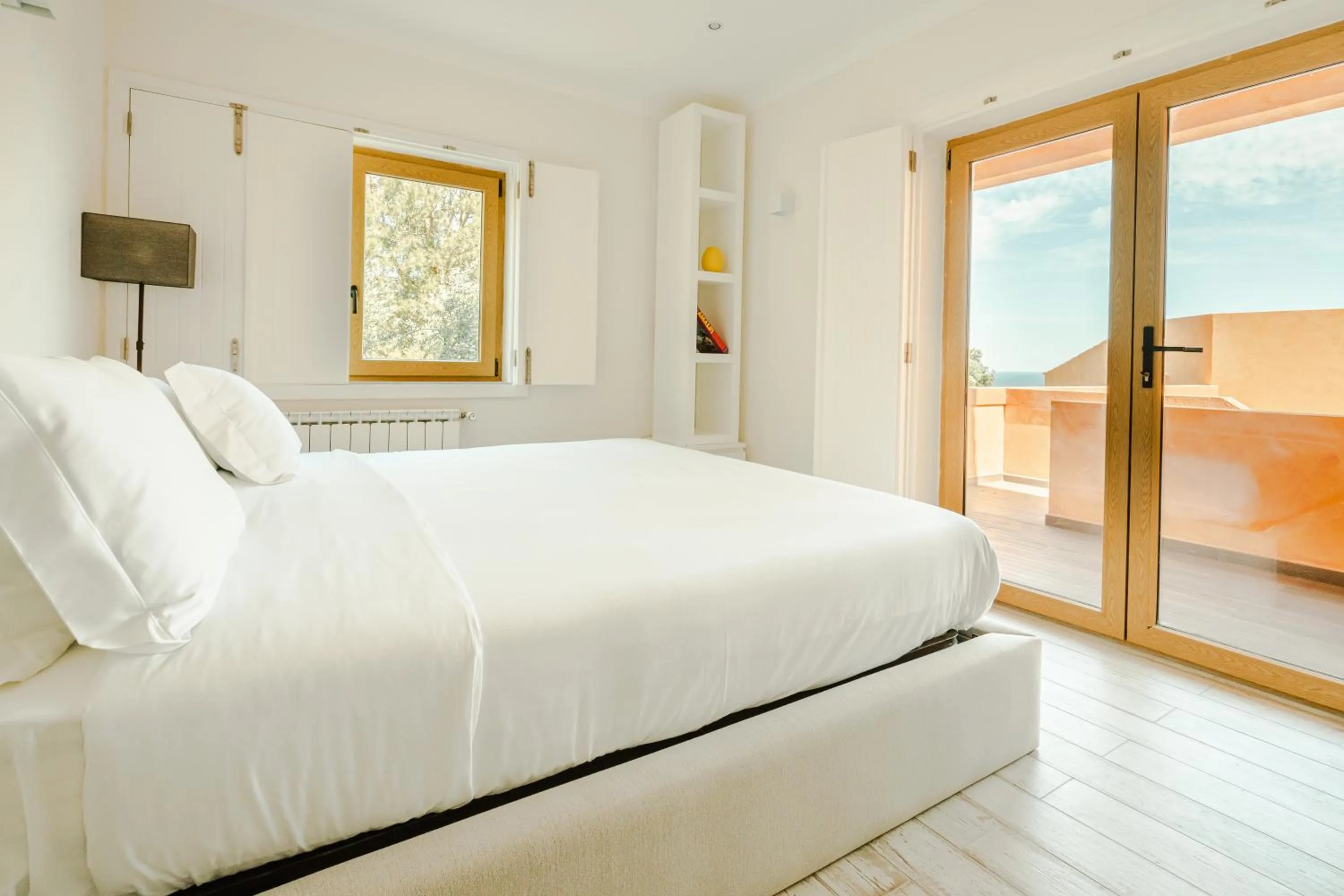 Bed in Casa Pôr do Sal - Boutique Guesthouse with Heated Pool & Sea Views