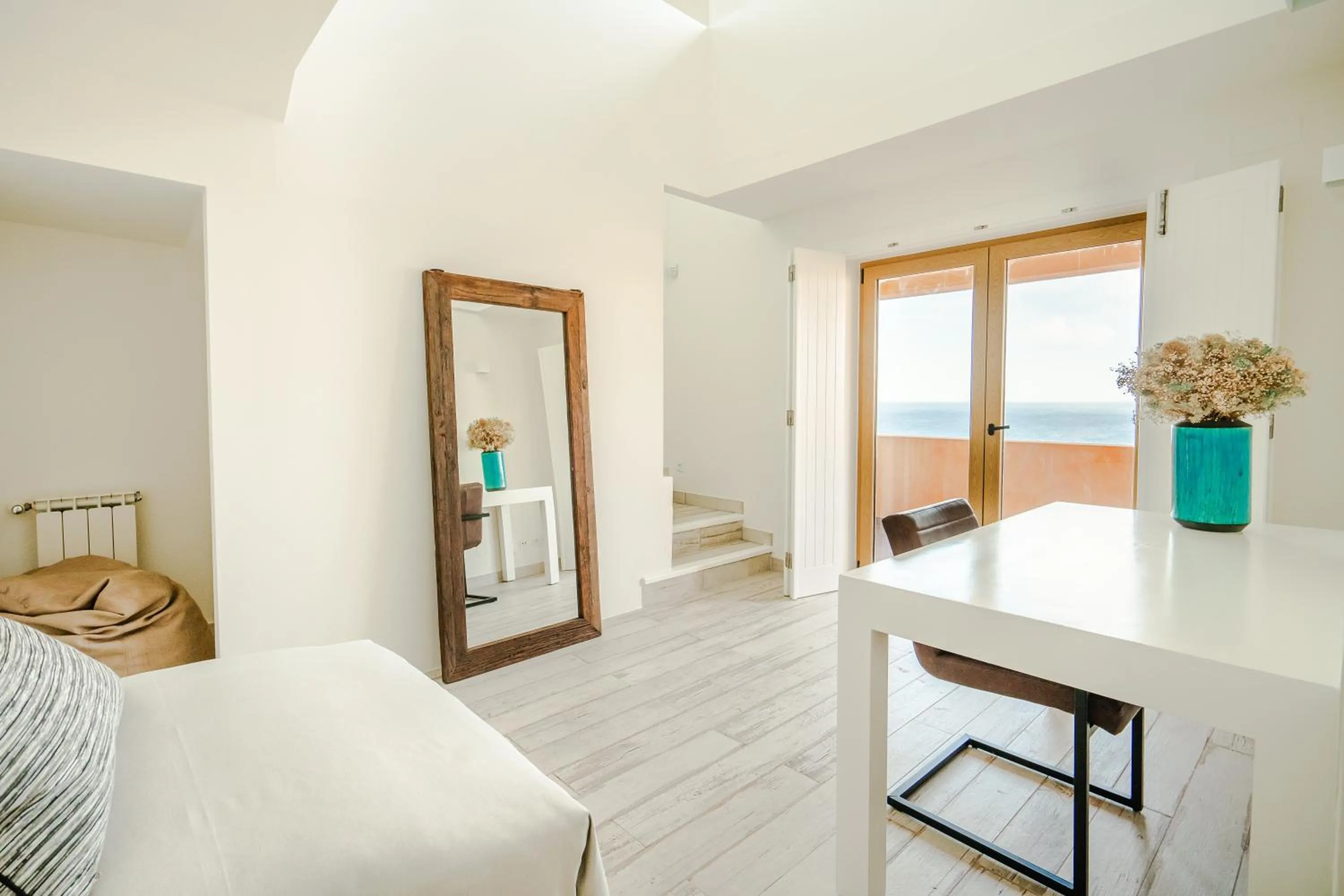 Living room, Bed in Casa Pôr do Sal - Boutique Guesthouse with Heated Pool & Sea Views