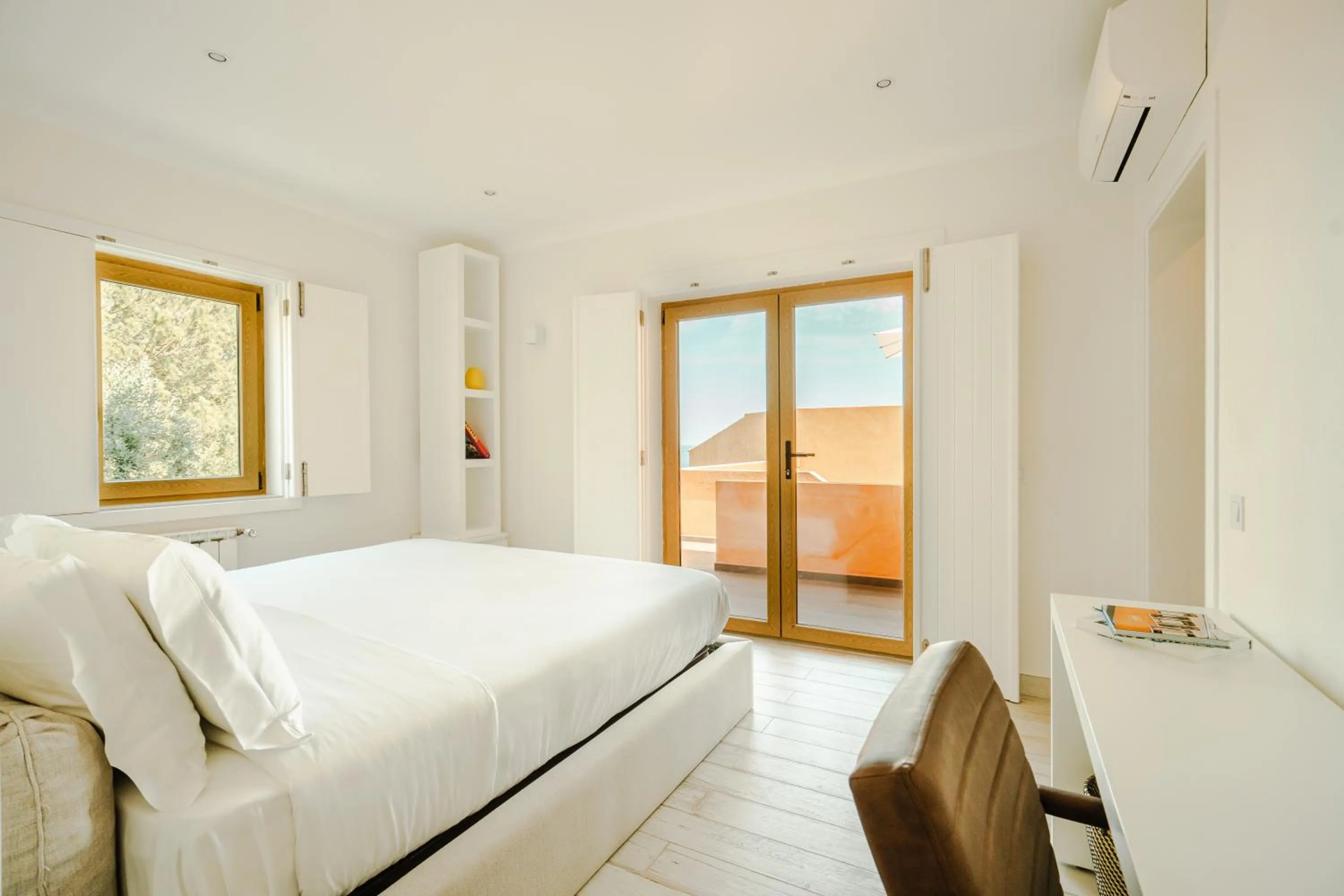 Bed in Casa Pôr do Sal - Boutique Guesthouse with Heated Pool & Sea Views