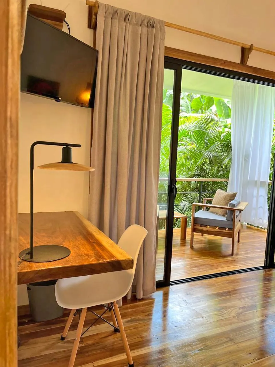Seating area, Bed in El Nido Jungle Lodge