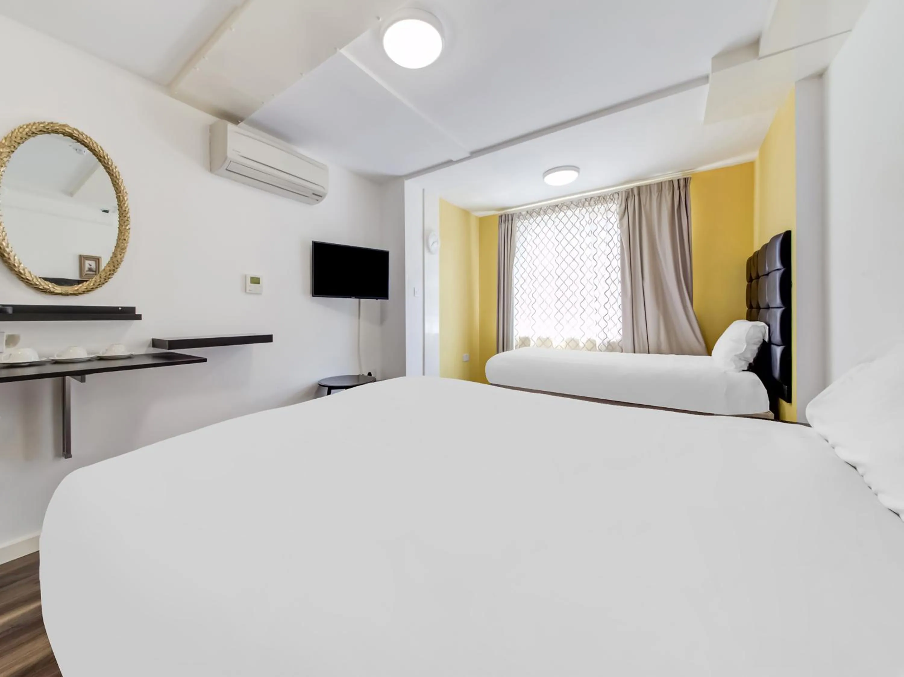 Bedroom in OYO Grantly Hotel