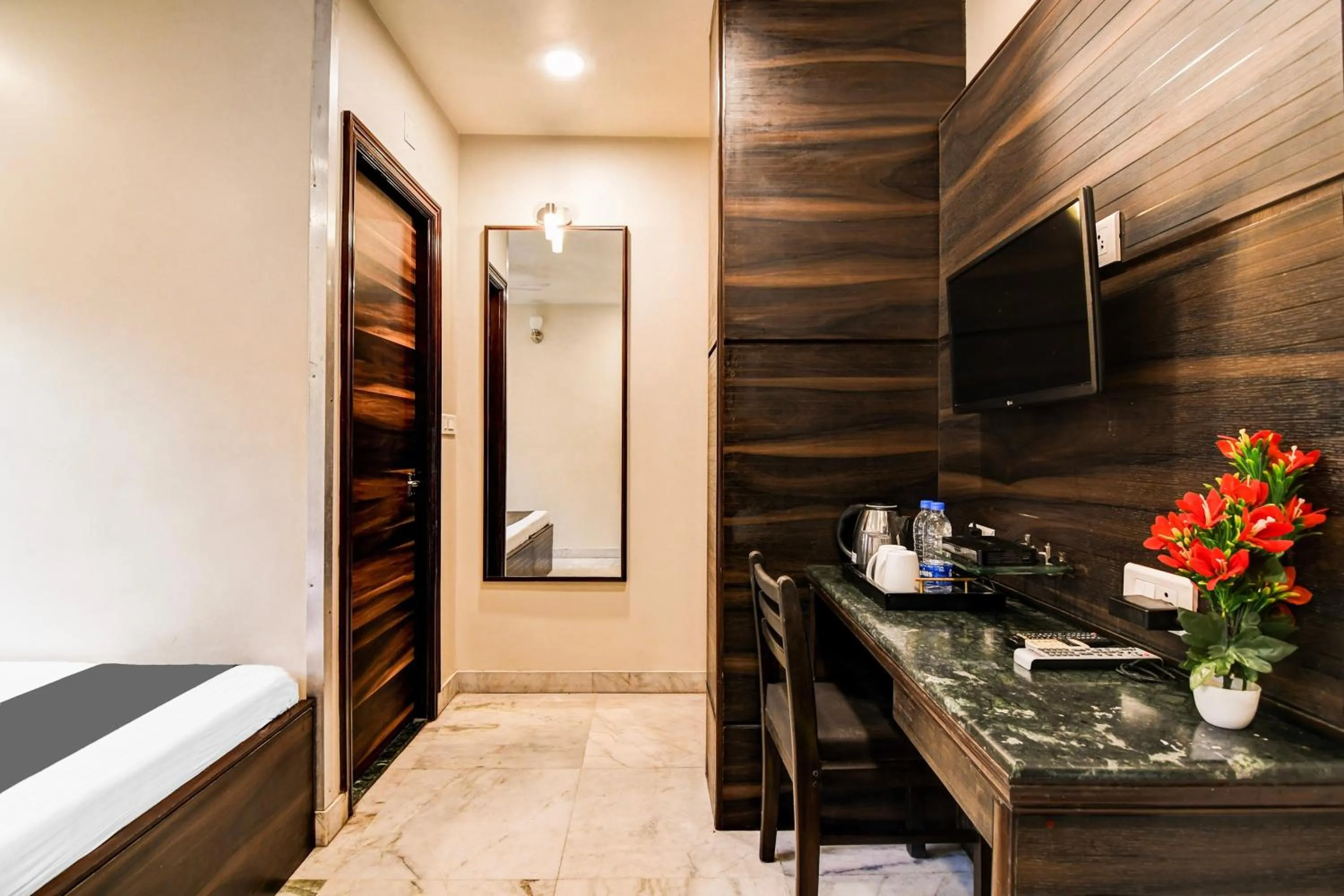 Bedroom in Super Collection O Belgacihia Near Kolkata Railway Station