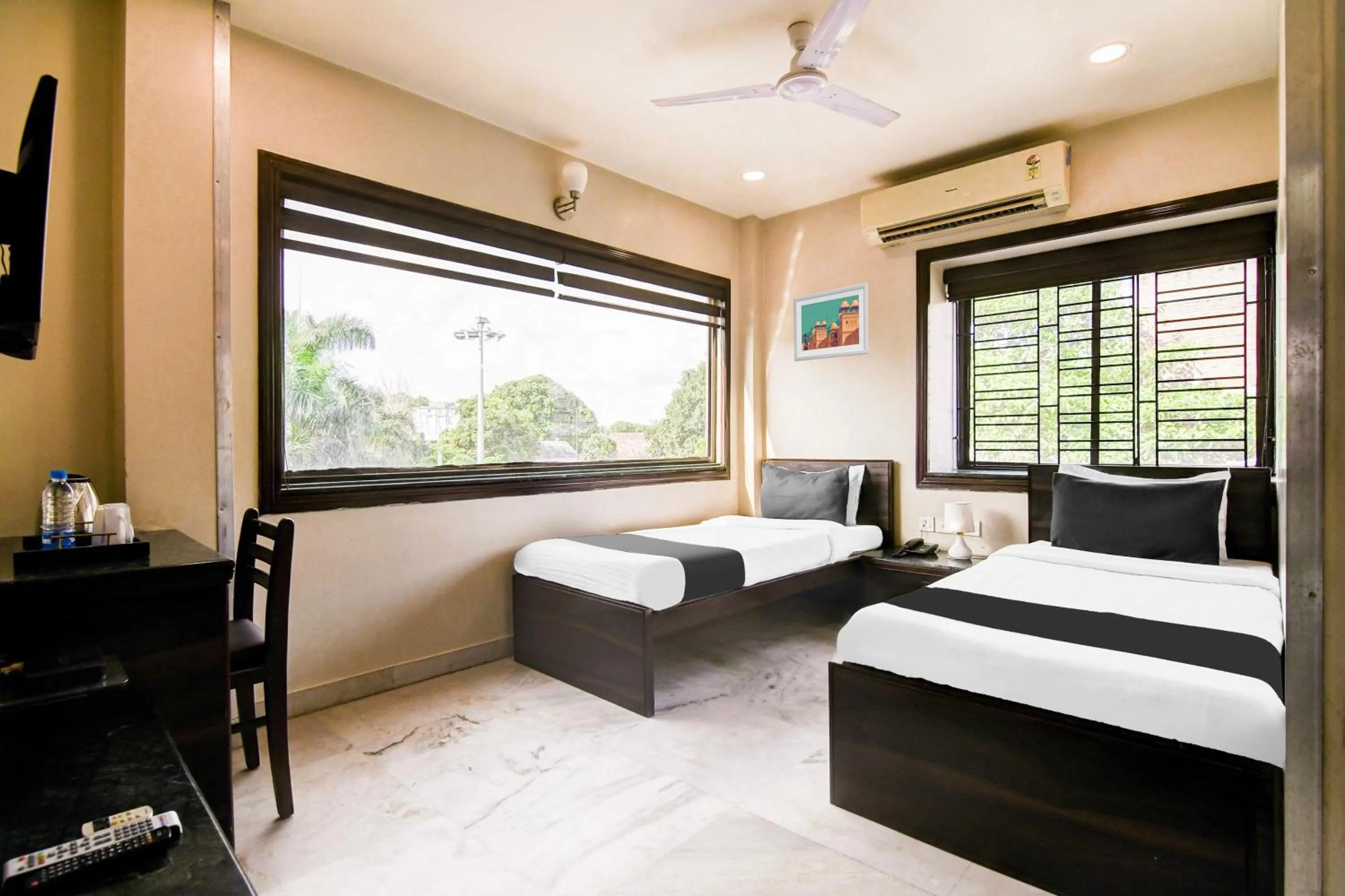 Bedroom in Super Collection O Belgacihia Near Kolkata Railway Station