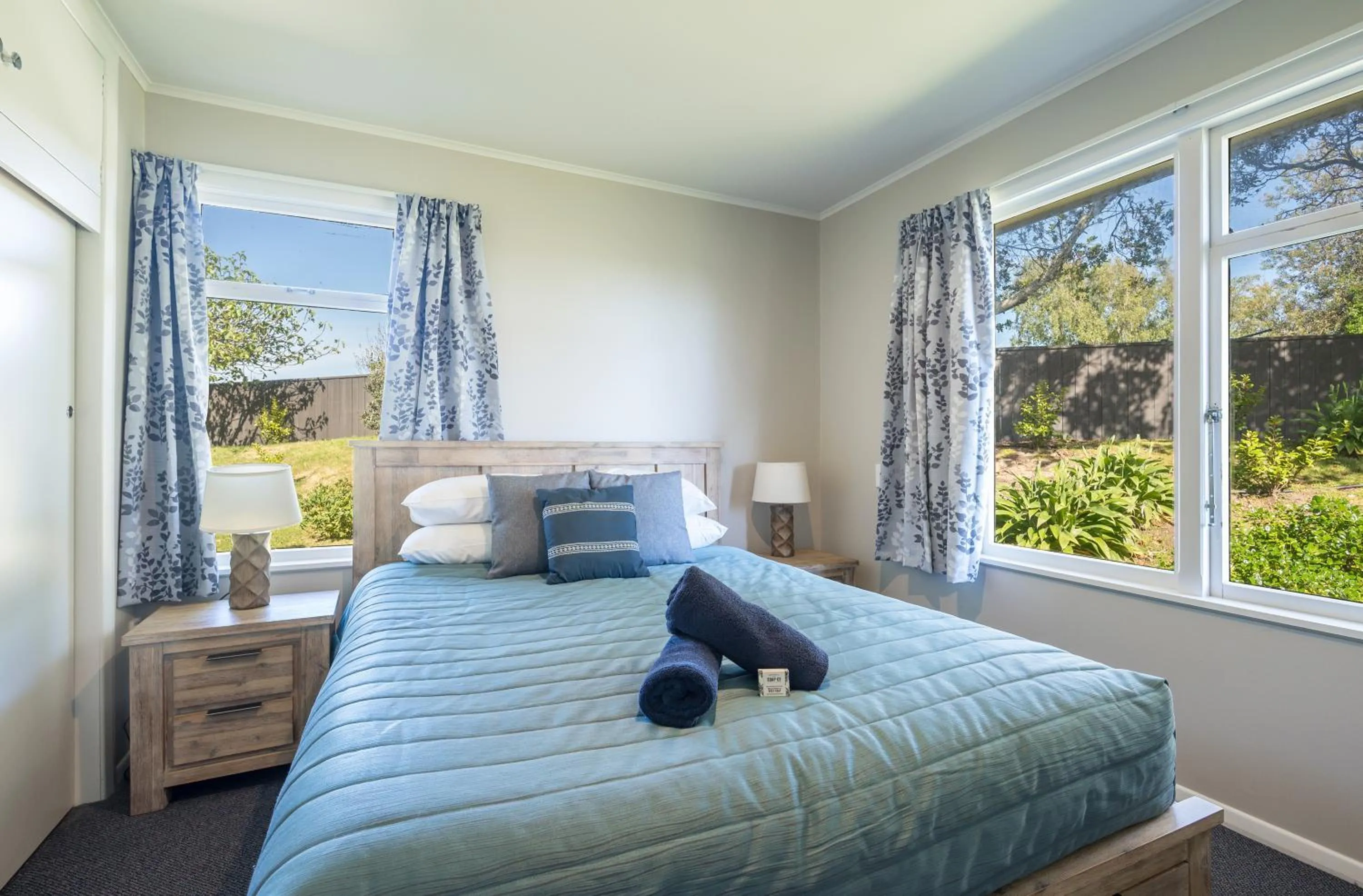 Bed in Tāhuna Beach Holiday Park