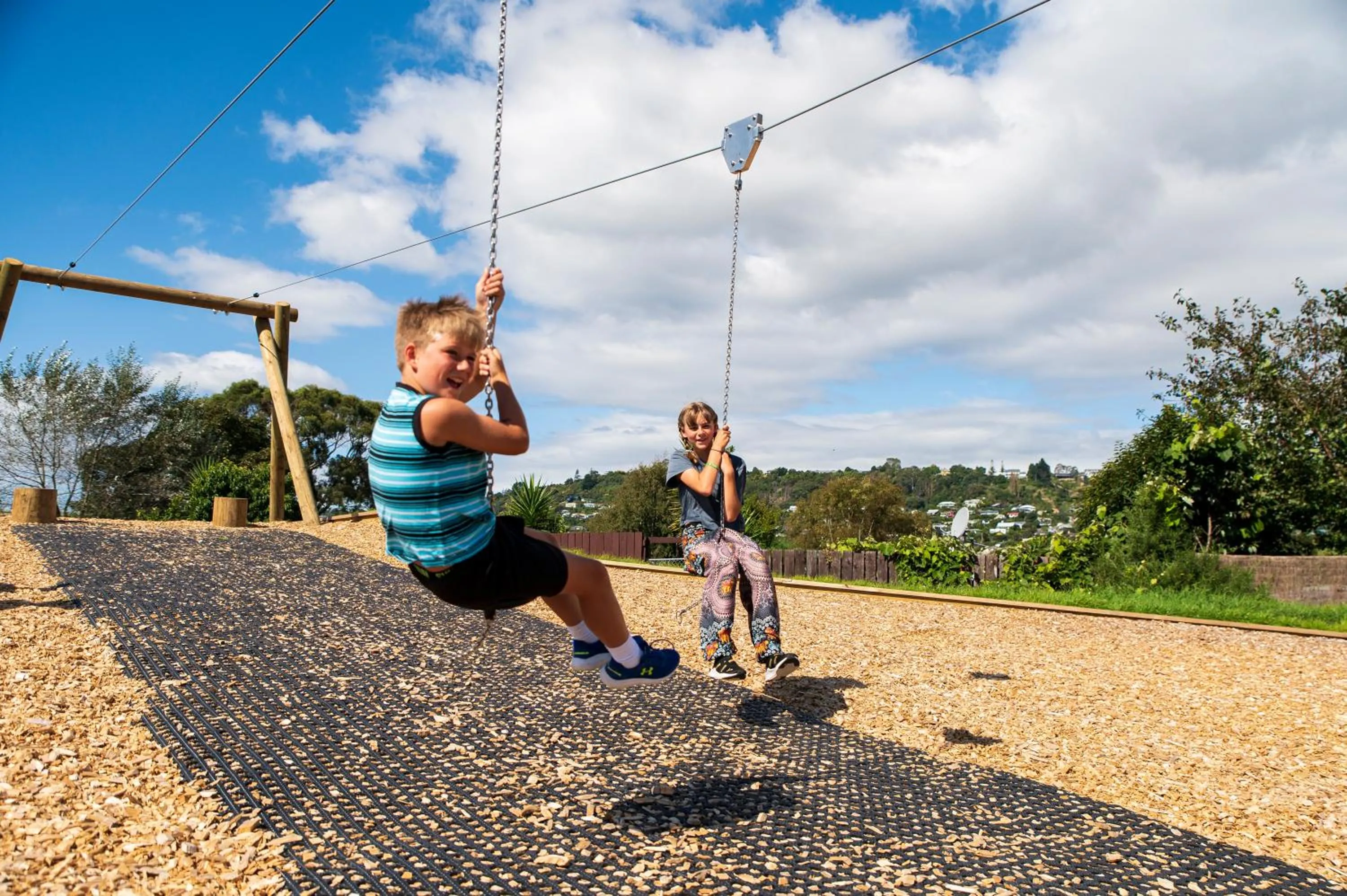 People in Tāhuna Beach Holiday Park