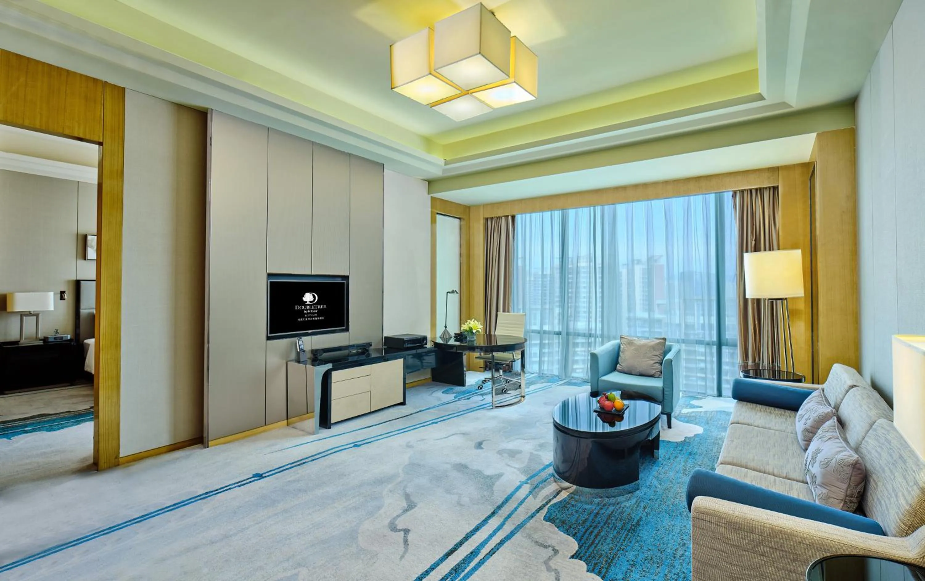Living room, Bed in DoubleTree by Hilton Heyuan