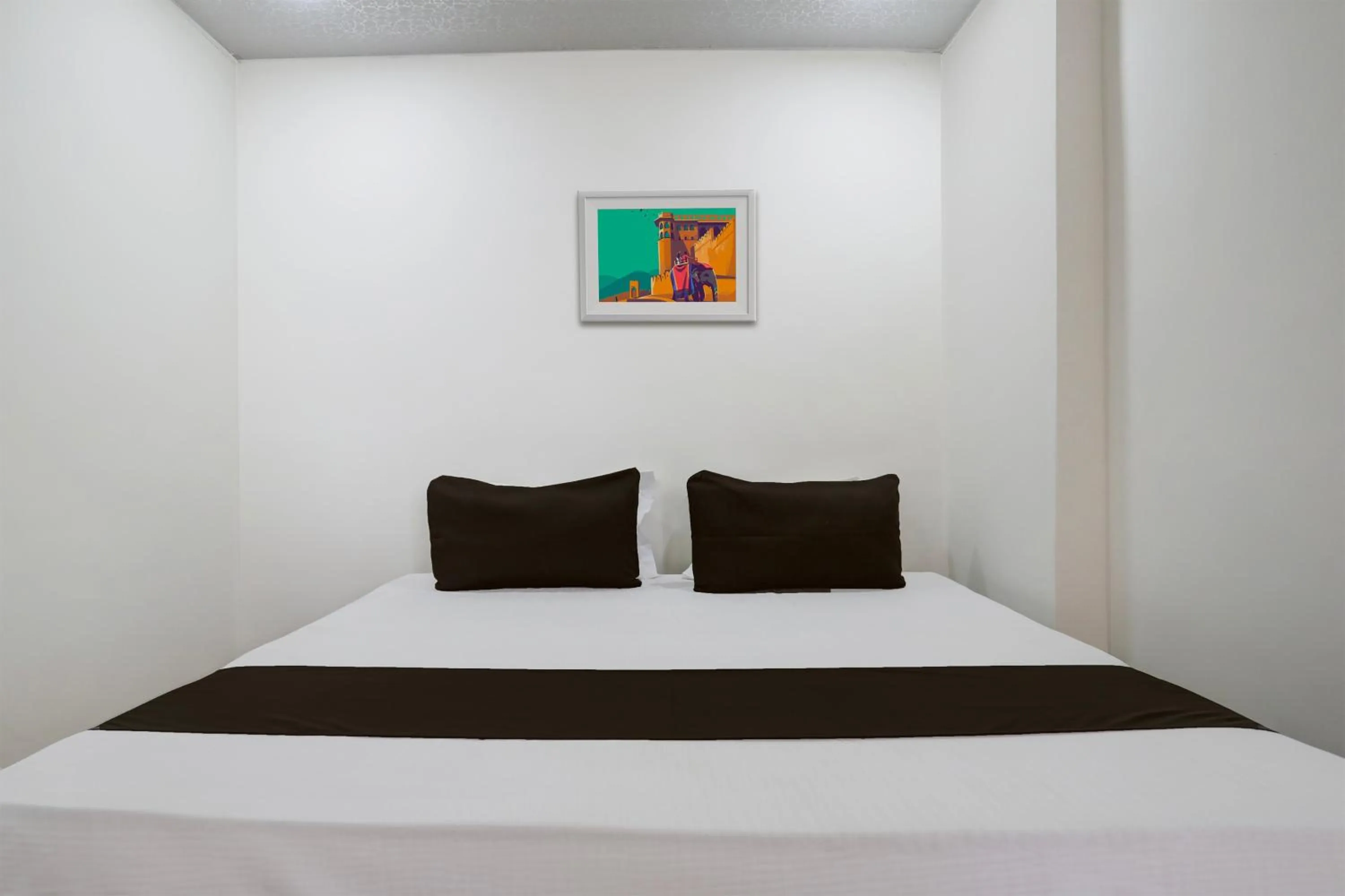 Bedroom in Hotel O Sky Villa