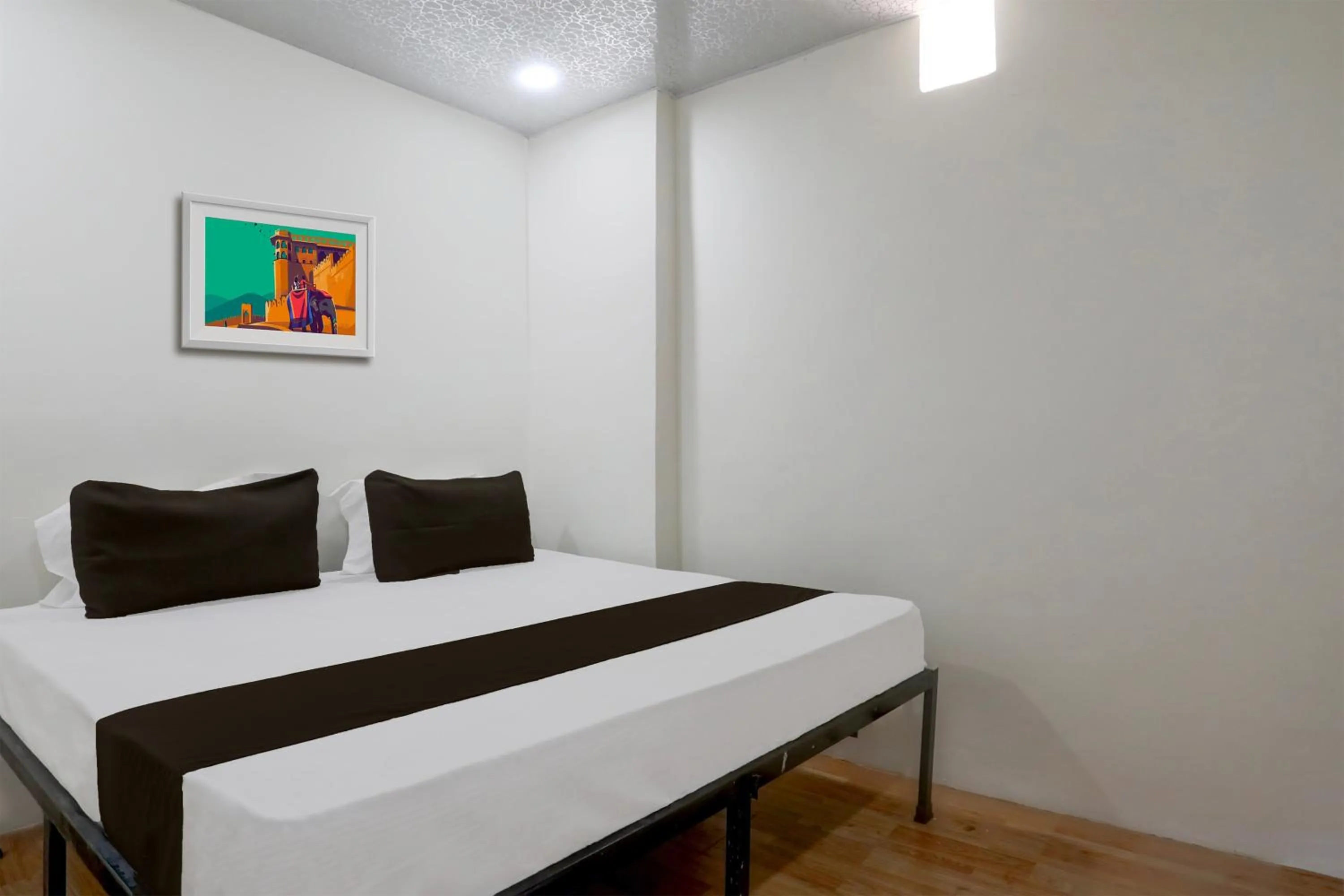 Bedroom in Hotel O Sky Villa