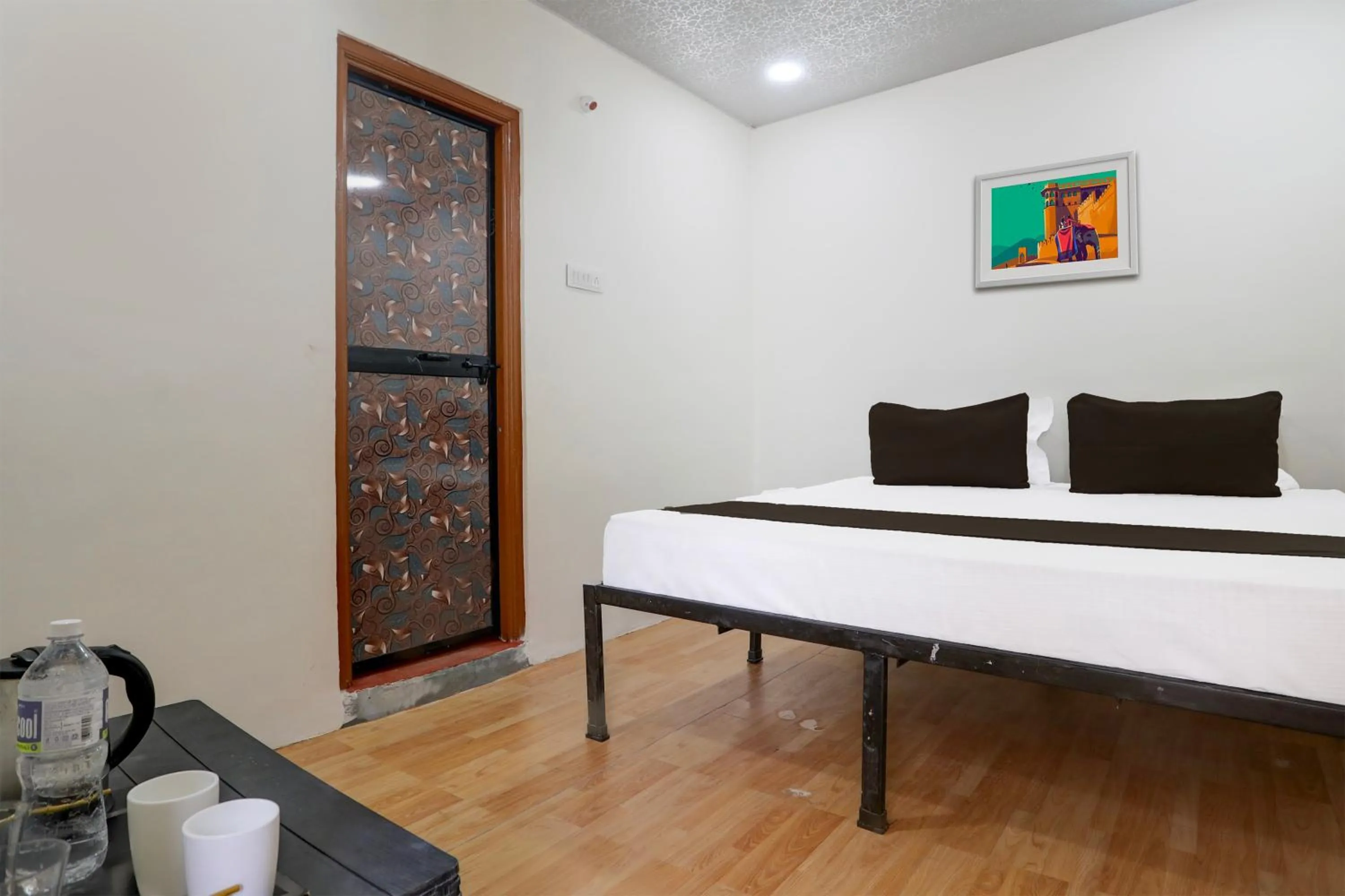 Bedroom in Hotel O Sky Villa