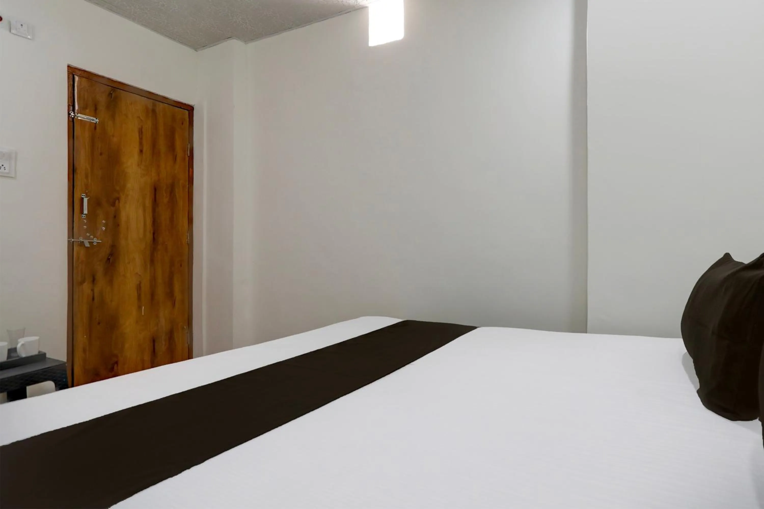 Bedroom in Hotel O Sky Villa