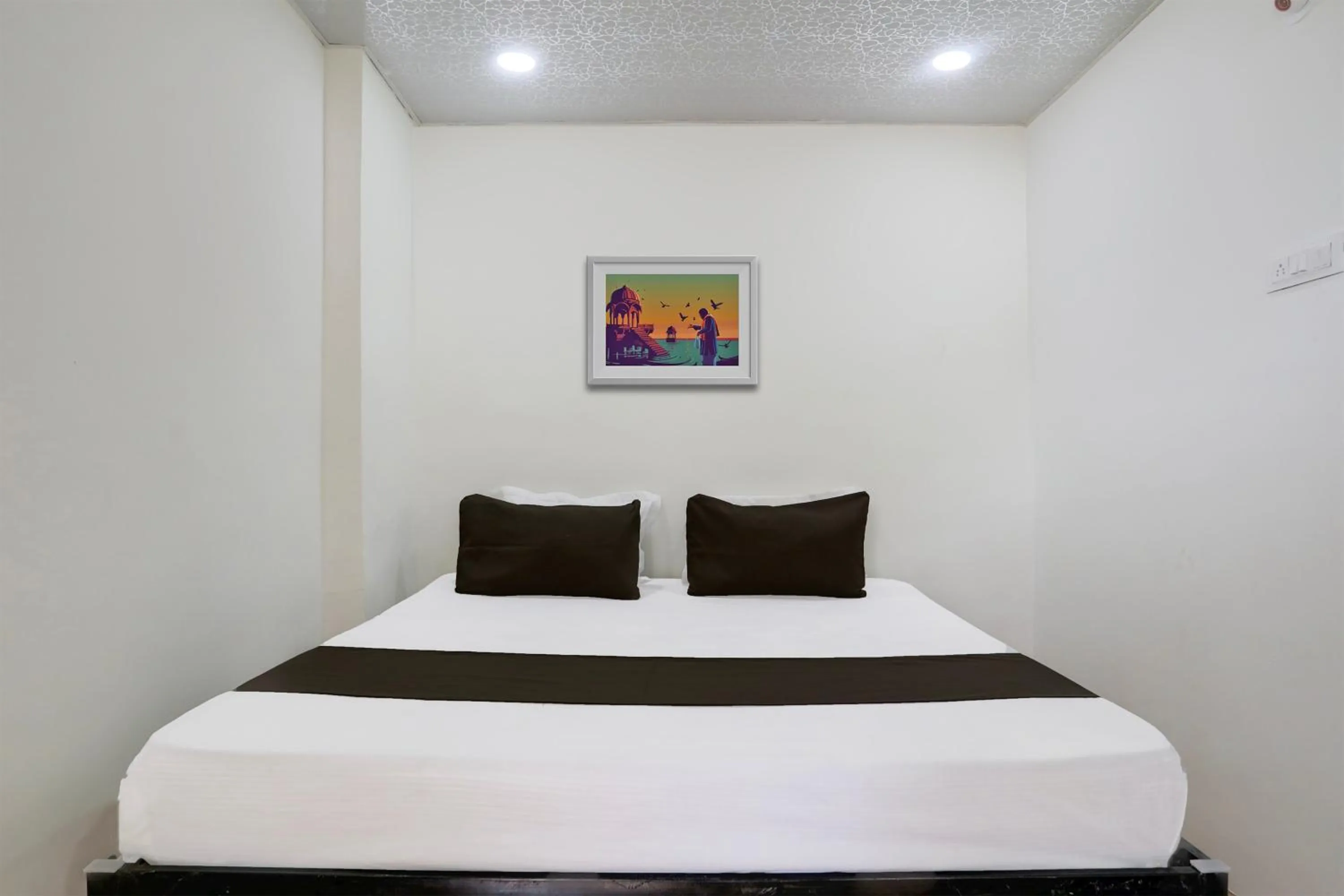 Bedroom in Hotel O Sky Villa