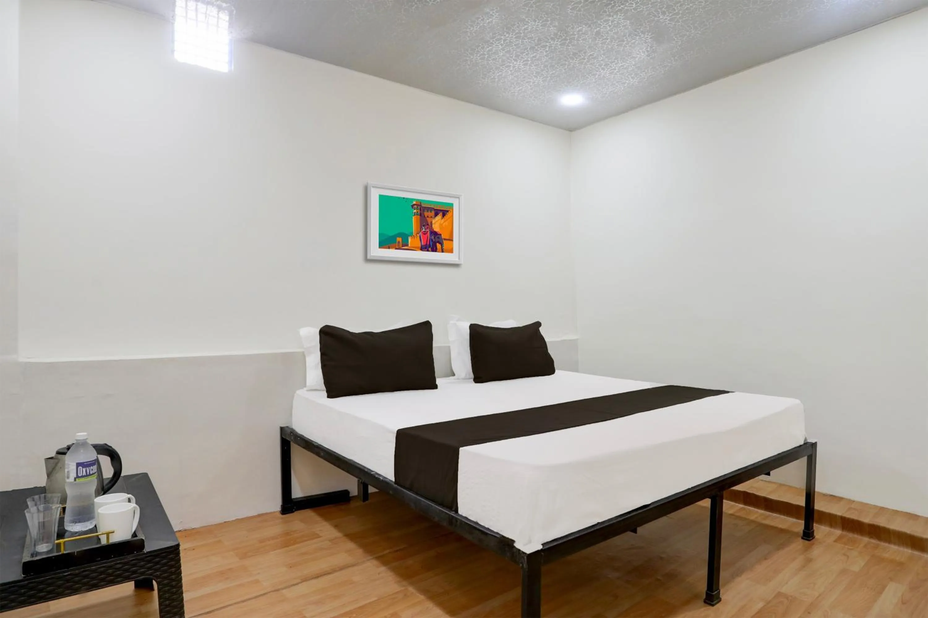 Bedroom in Hotel O Sky Villa