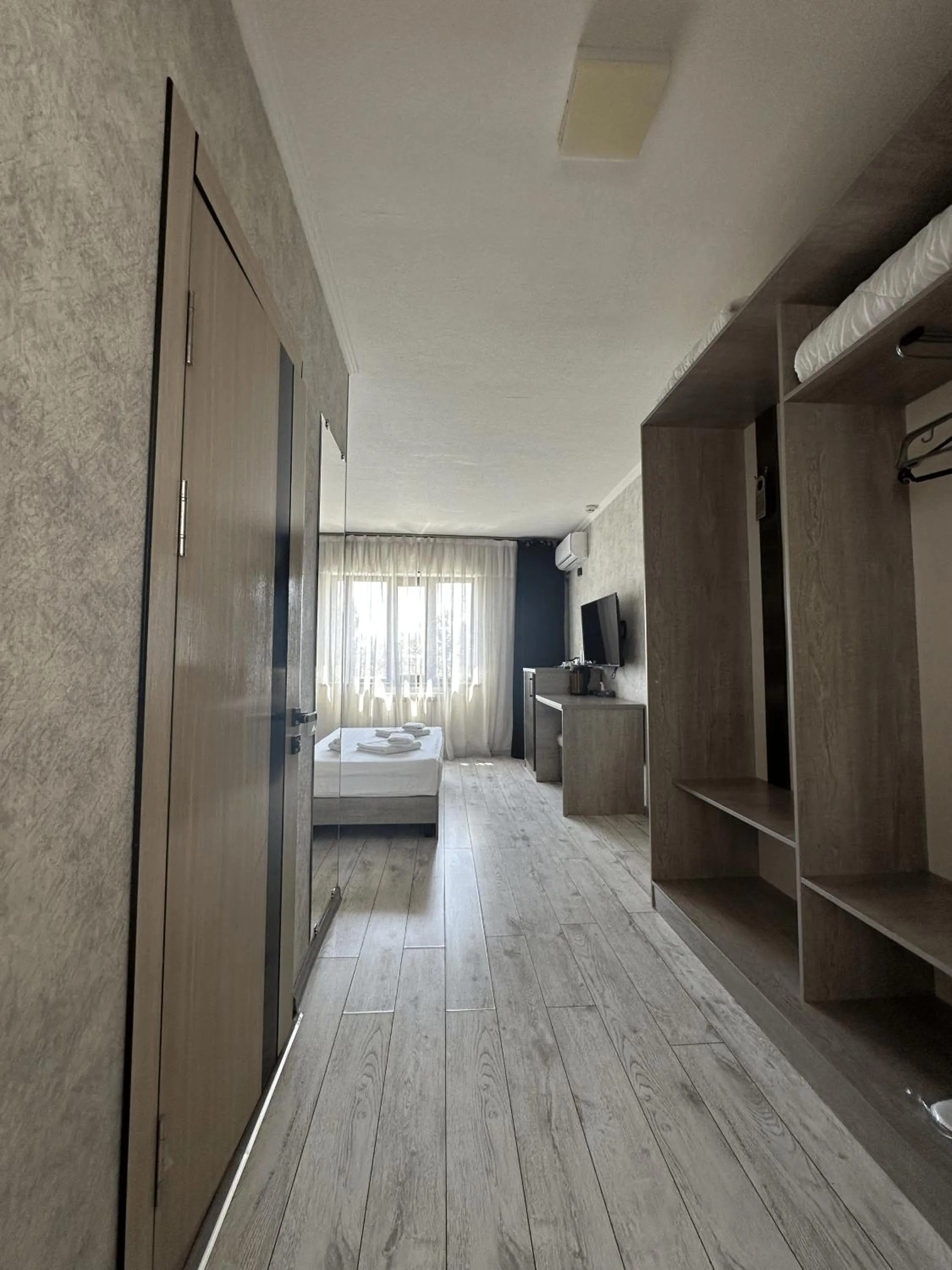 Bed in Artist Regency Hotel