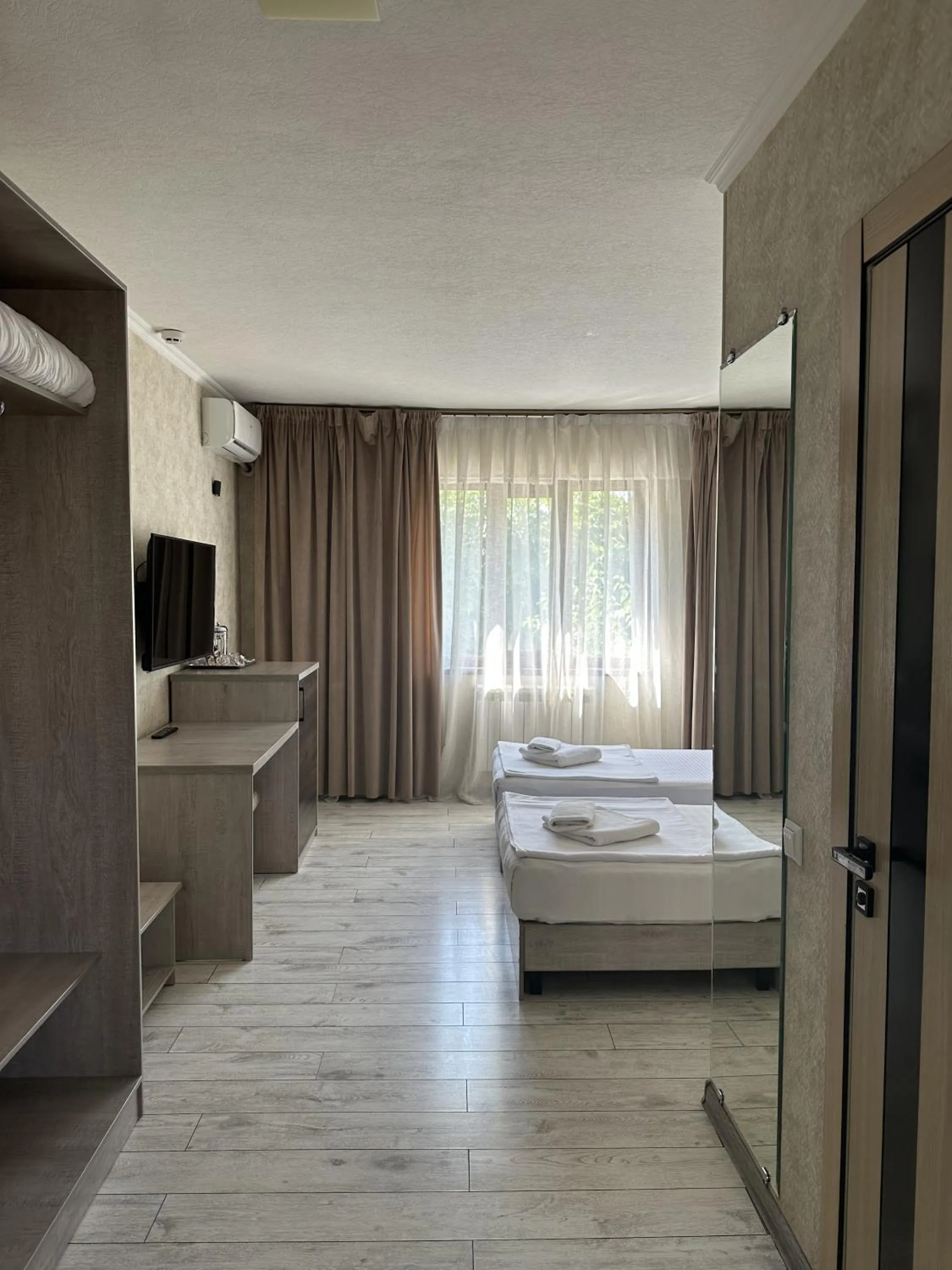 Bed in Artist Regency Hotel