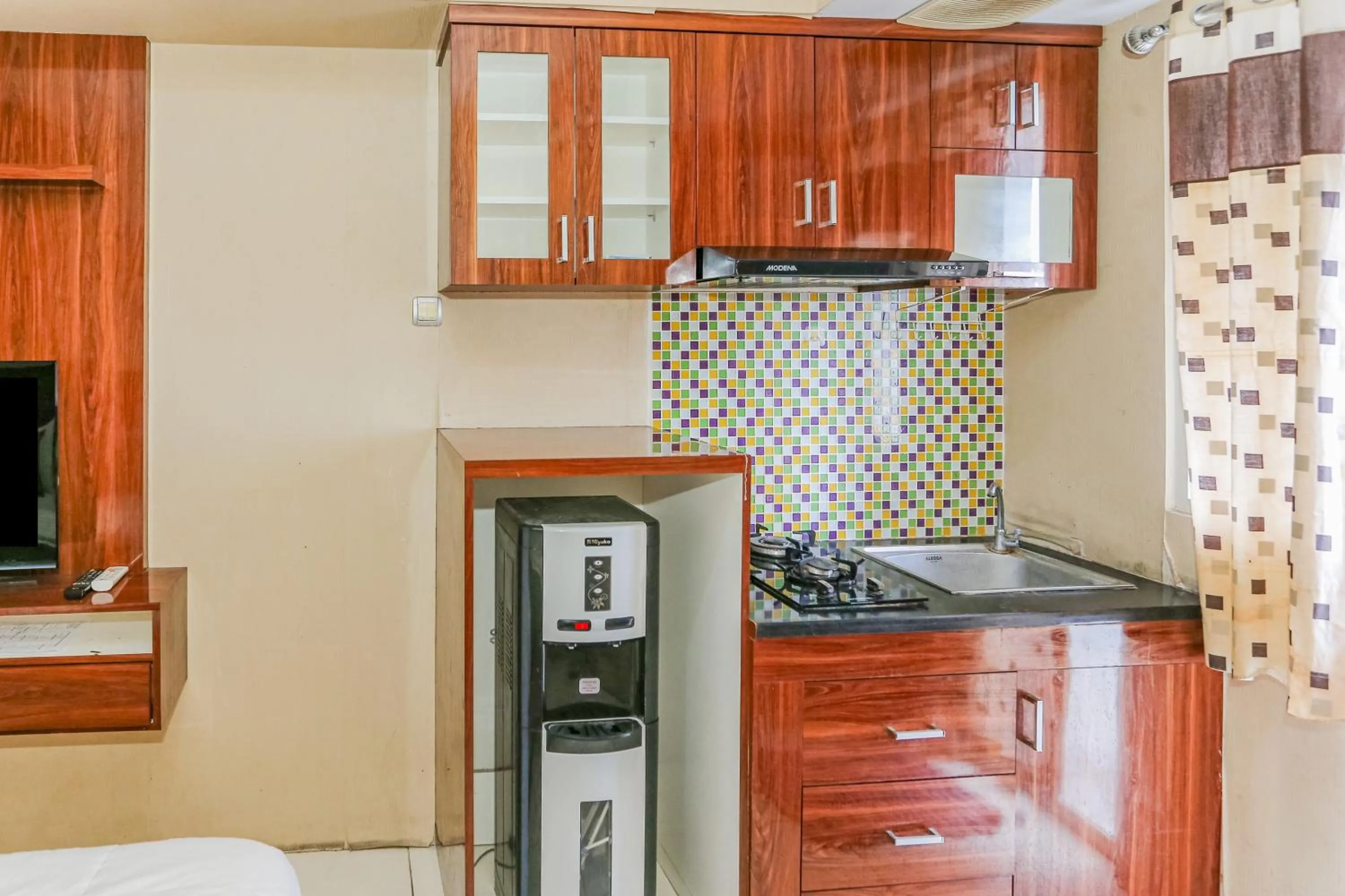 Bedroom in Hotel O Ciputat Near Apartment Green Lake View Ciputat