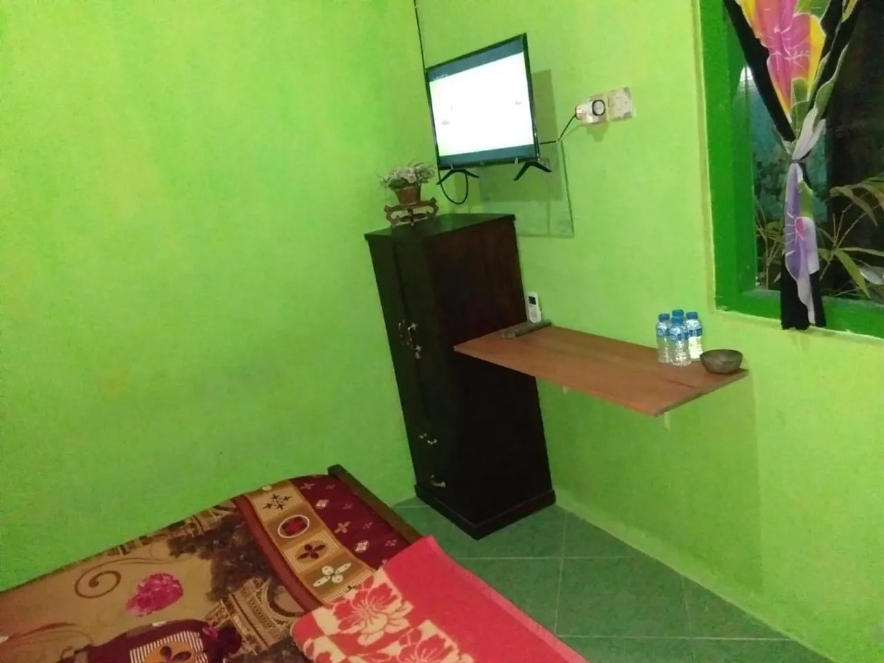 Bedroom in Hotel O Wisma Kost & Penginapan Afilia Buana Syariah