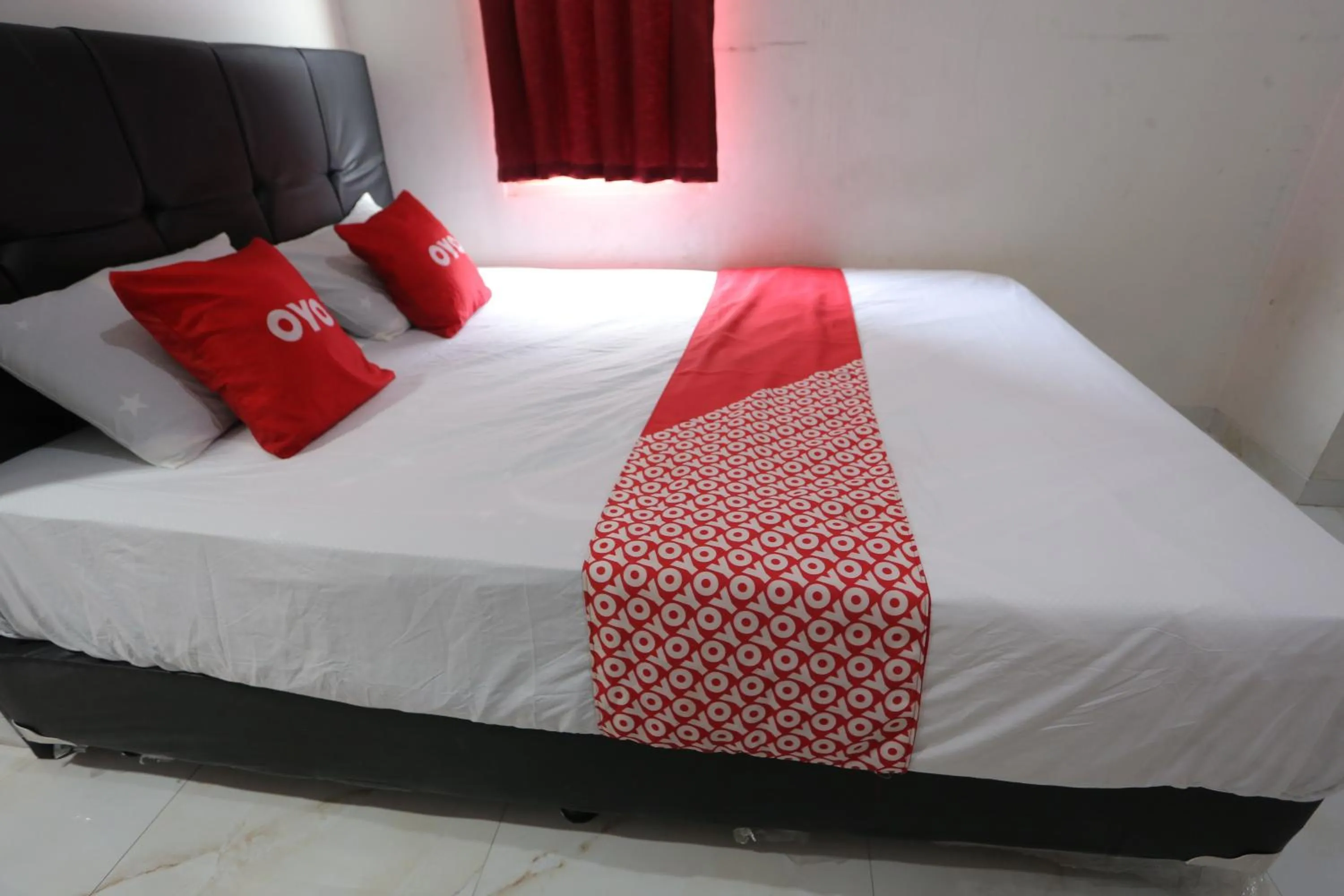 Bedroom in OYO 93948 Bunda Rachma Rooms