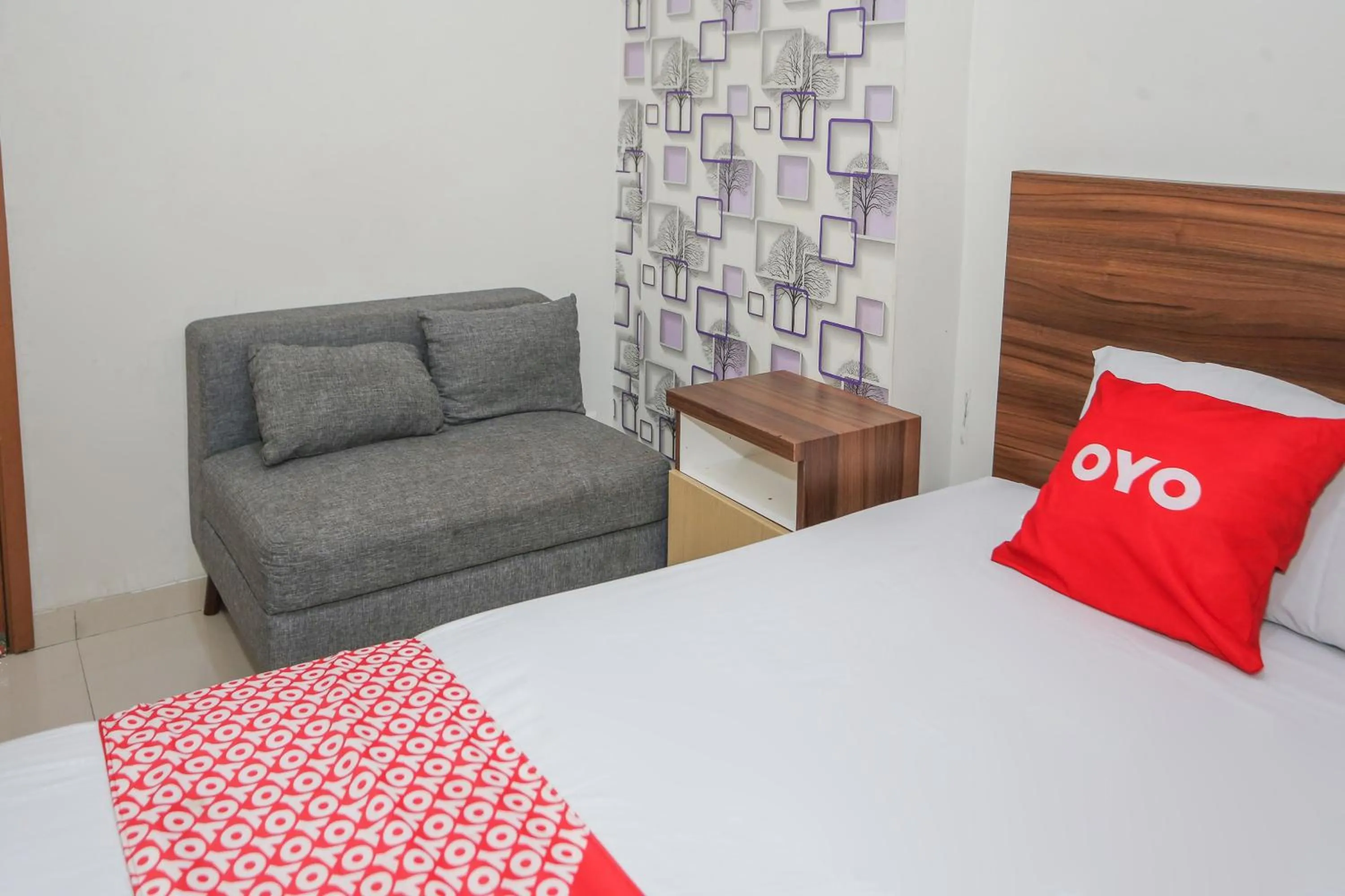 Bedroom in OYO 93948 Bunda Rachma Rooms