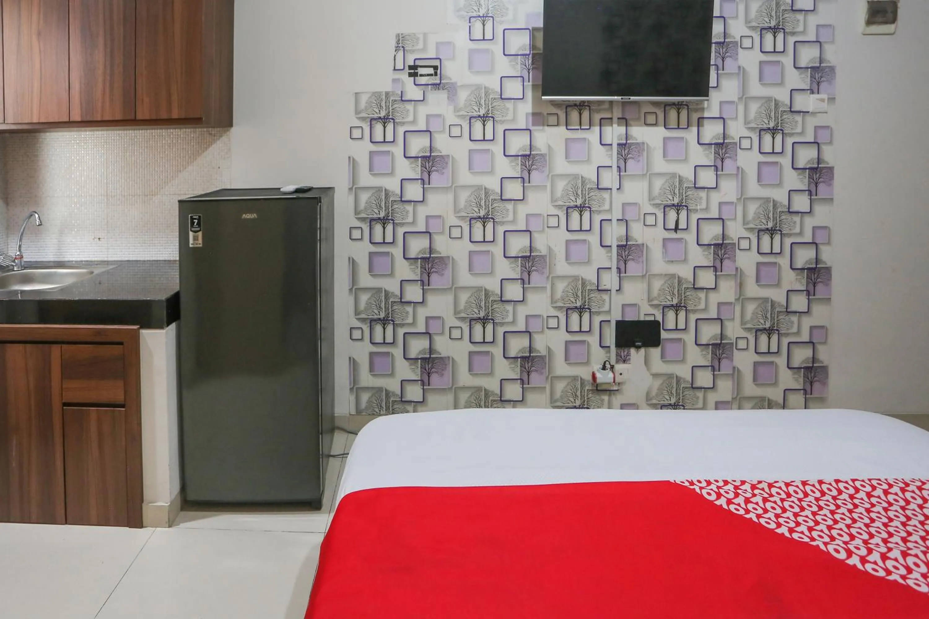 Bedroom in OYO 93948 Bunda Rachma Rooms