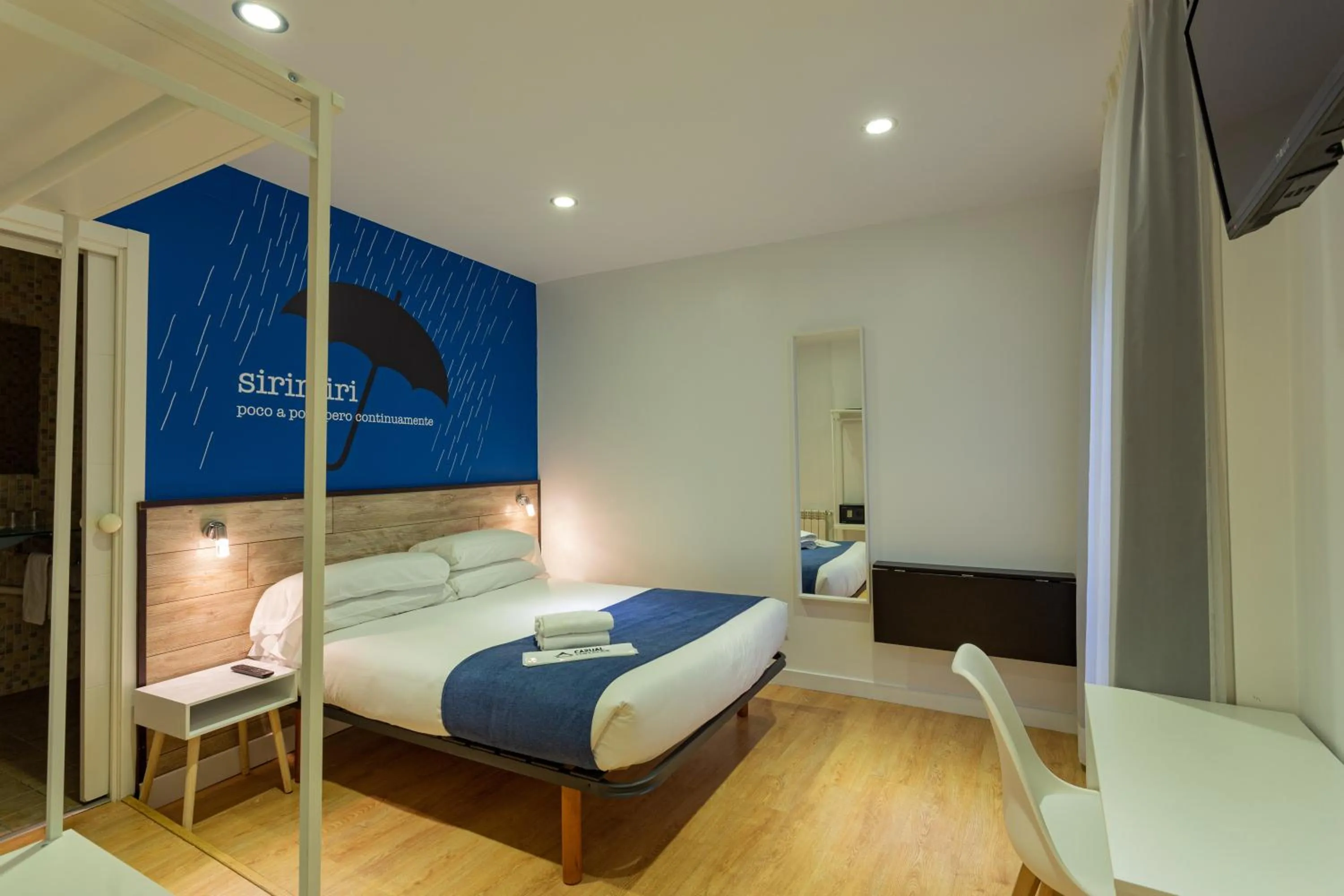 Photo of the whole room, Bed in Casual Blue