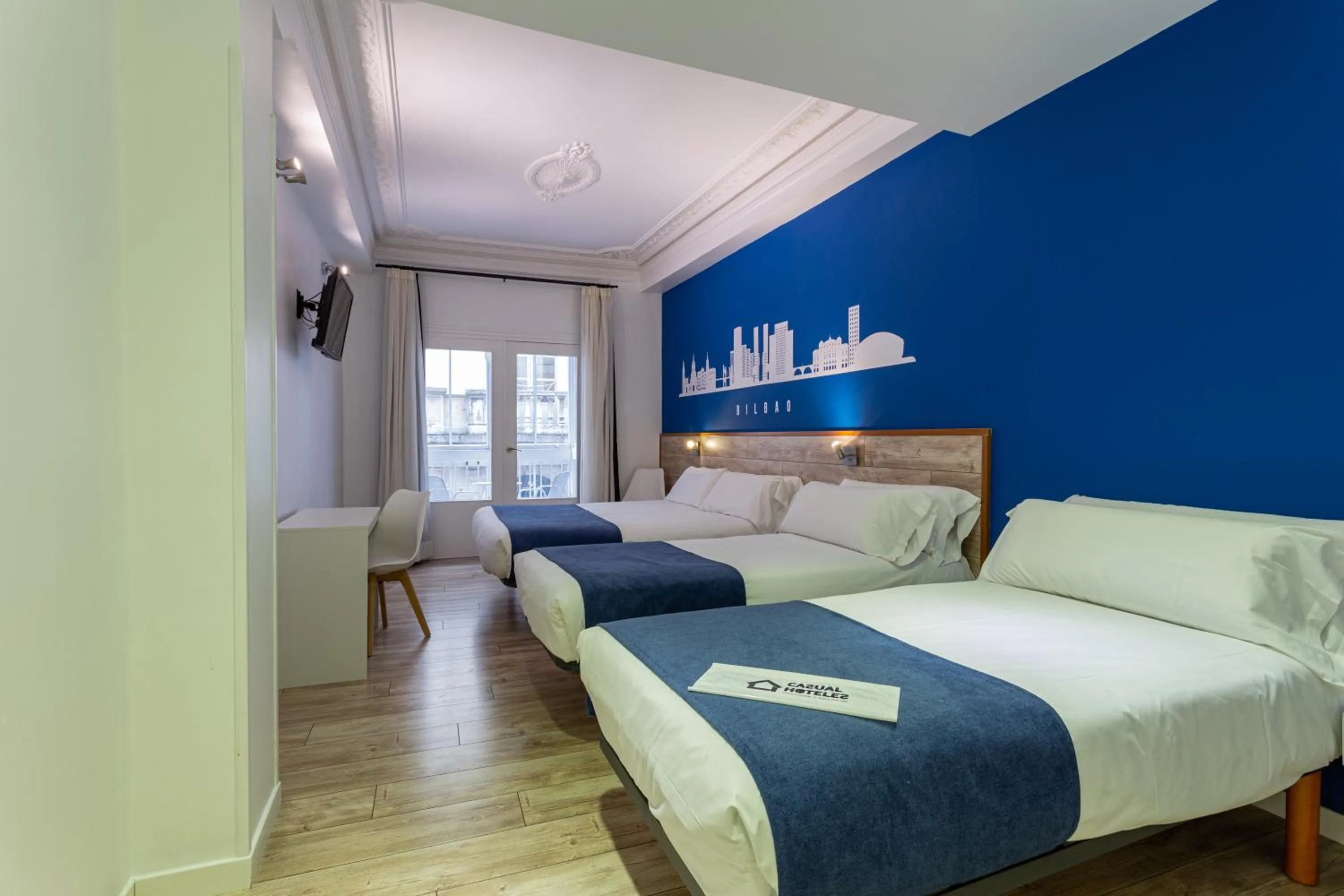 Photo of the whole room, Bed in Casual Blue