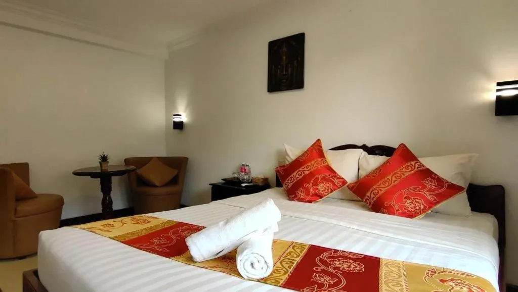 Bed in La Villa du Bonheur