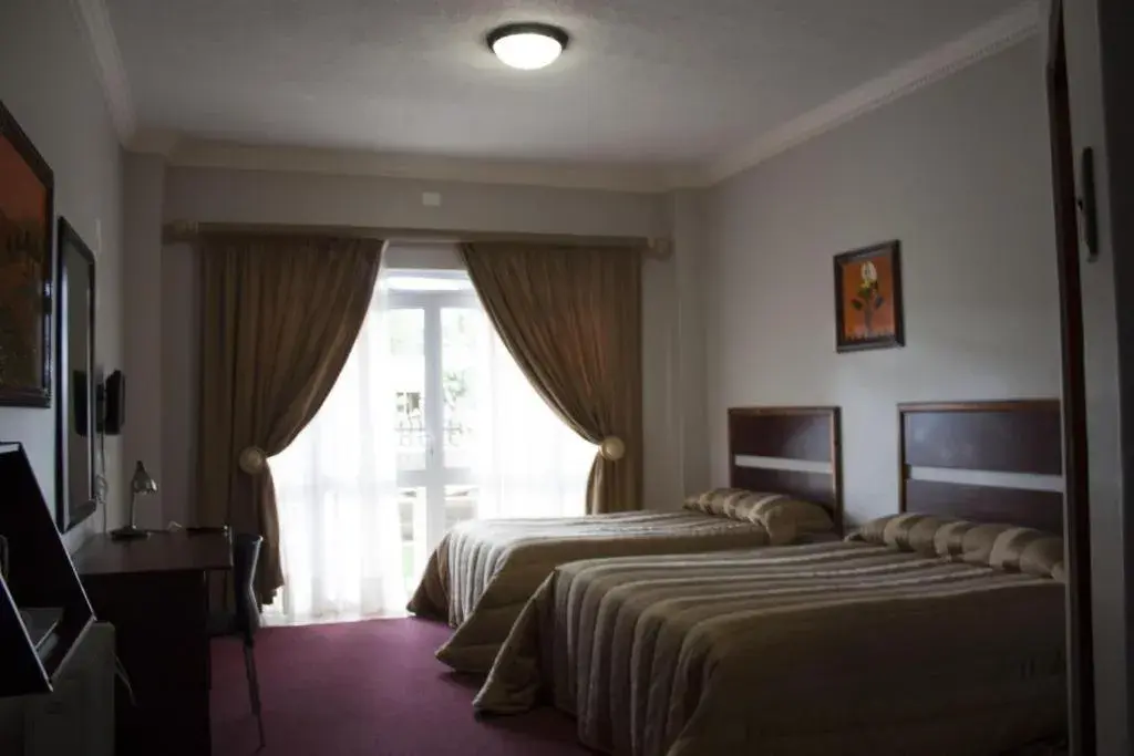 Triple Room with Balcony in Hotel Mount Maluti - Lesotho Triple Room with Balcony in Hotel Mount Maluti - Lesotho