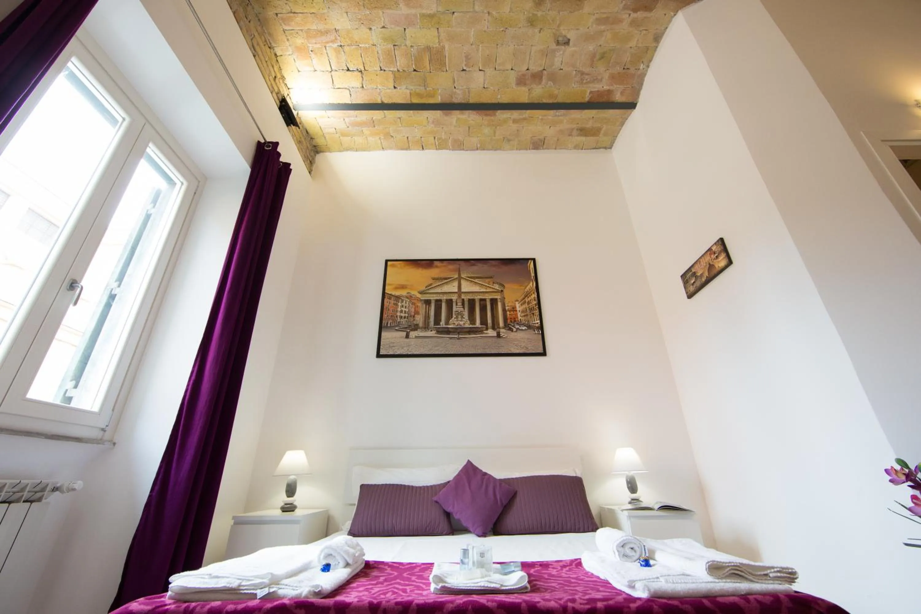 Photo of the whole room, Bed in The Great Beauty