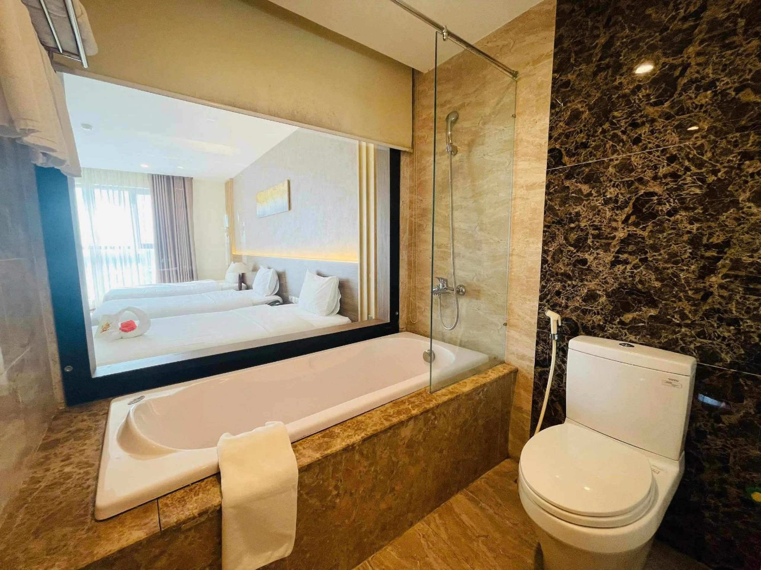 Bath, Bed in Muong Thanh Grand Quang Tri Hotel