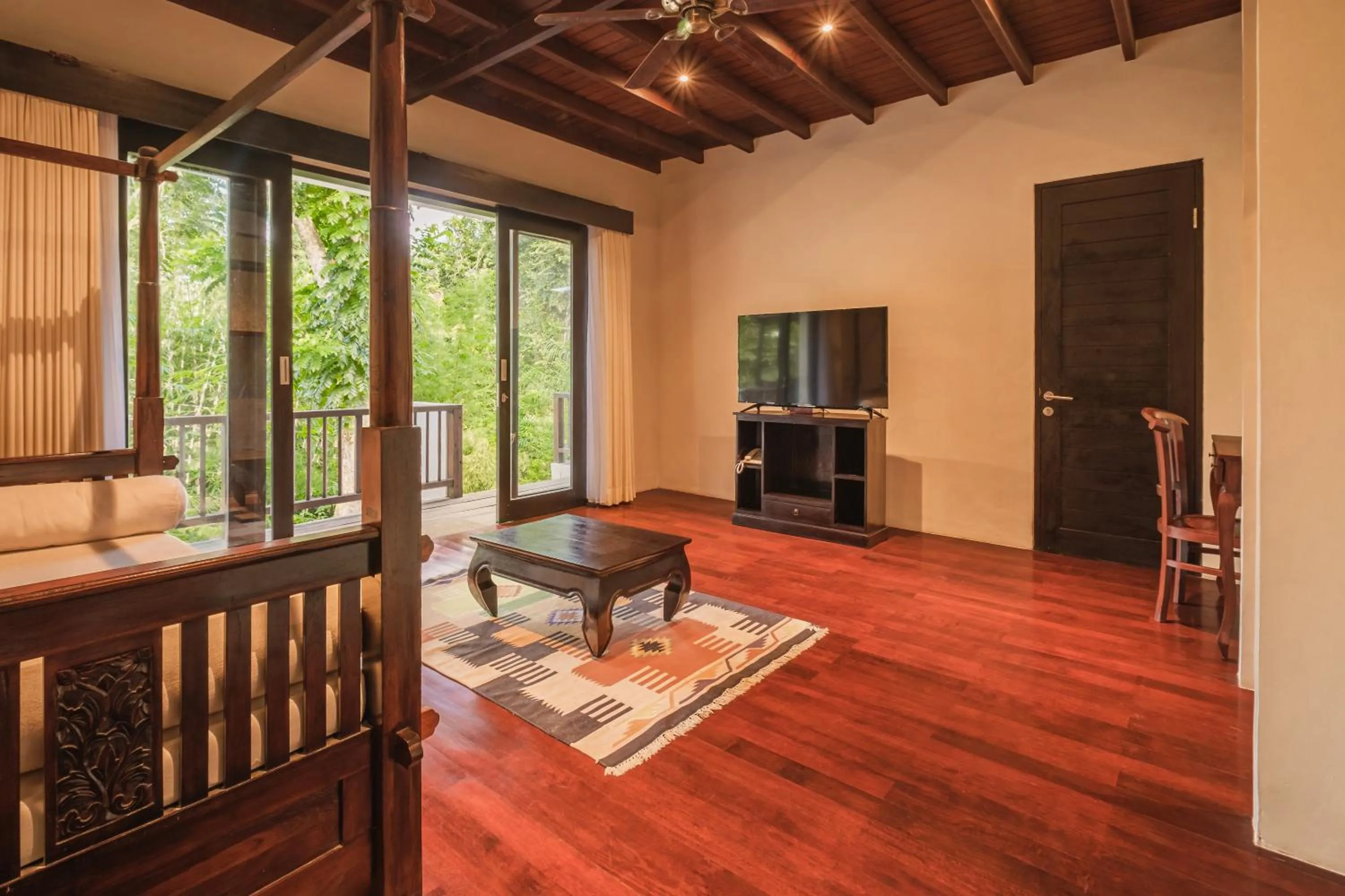 Communal lounge/ TV room in BeingSattvaa Luxury Ubud