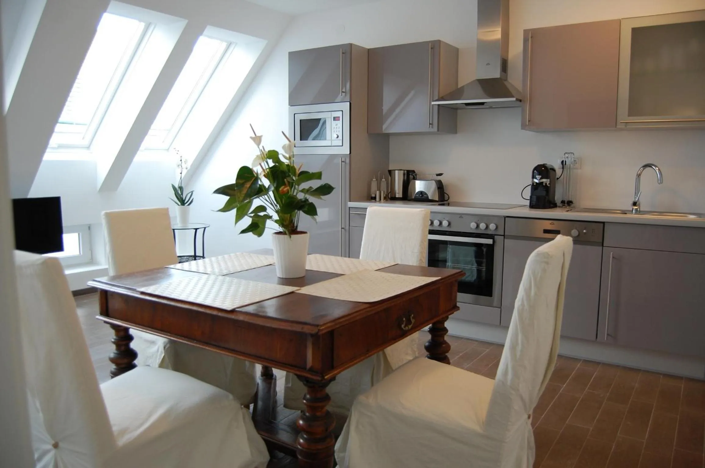 Kitchen or kitchenette in Alga Apartments am Westbahnhof