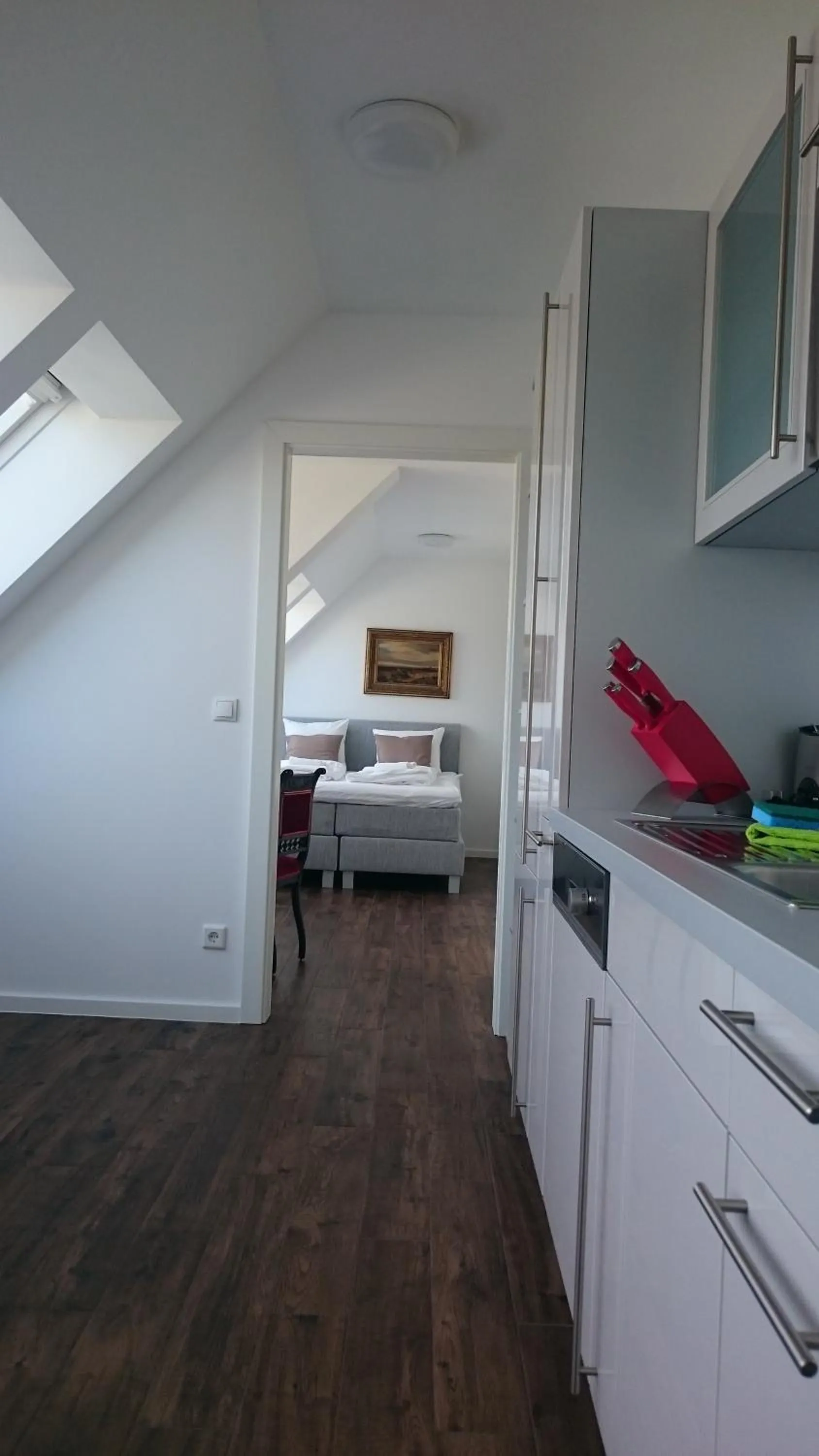 Kitchen or kitchenette, Bed in Alga Apartments am Westbahnhof