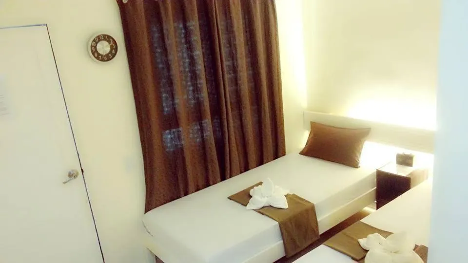 Bed in Joaquinn's Bed and Breakfast